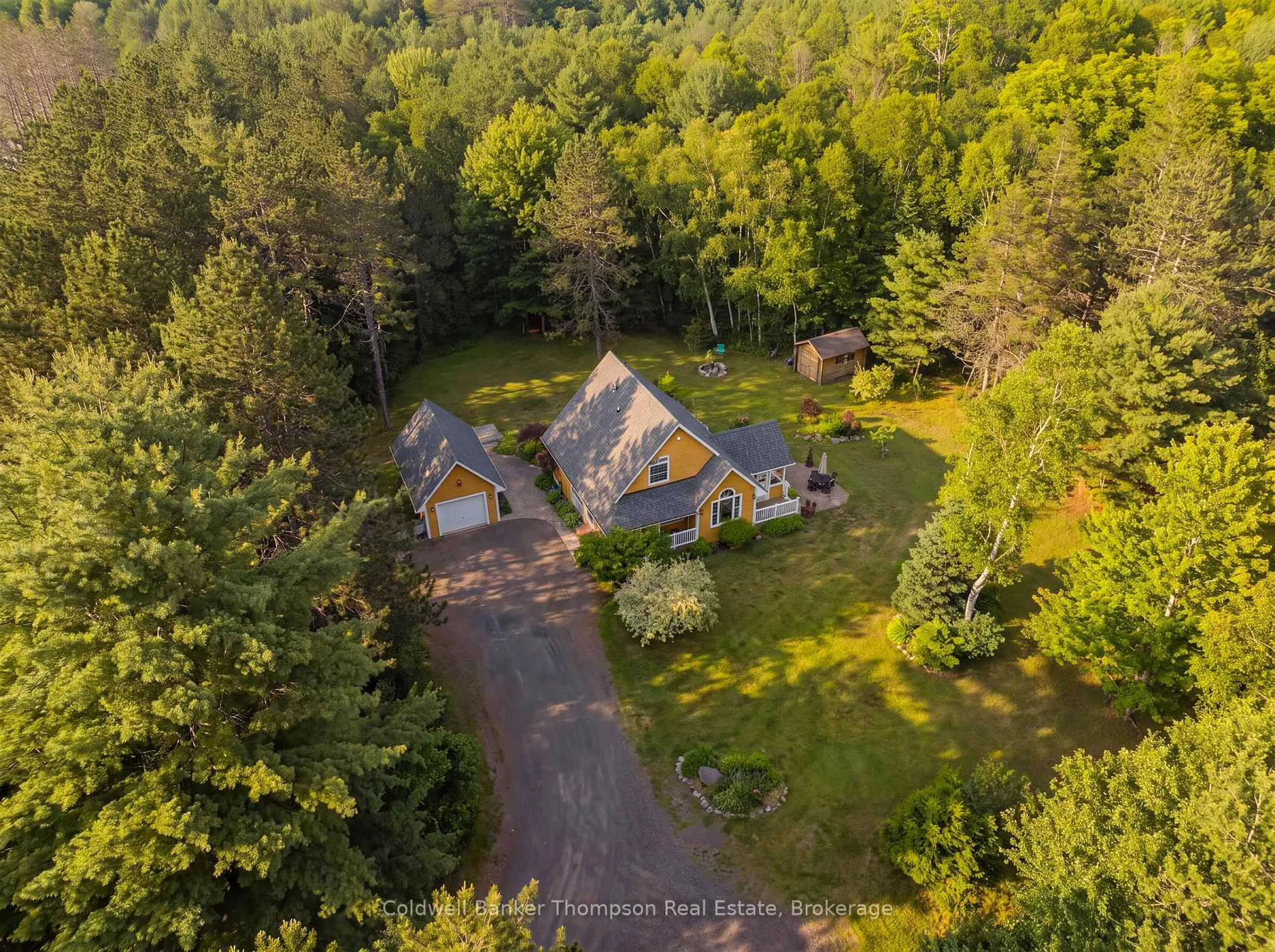 A pic from outside/outdoor area/front of a property/back of a property/a pic from drone, forest/trees view for 3425 Brunel Rd, Lake of Bays Ontario P1H 2J3