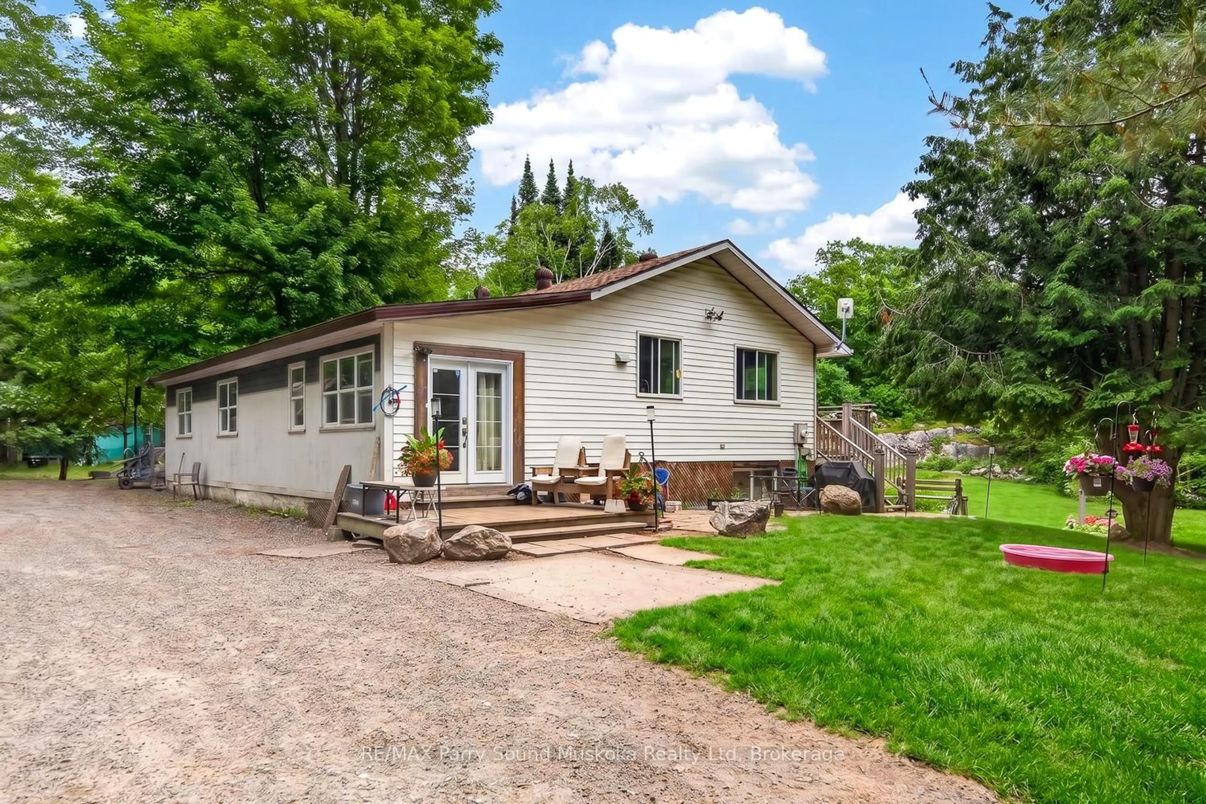 Home with vinyl exterior material, street for 15 Toronto Lake Rd, Georgian Bay Ontario P0C 1H0