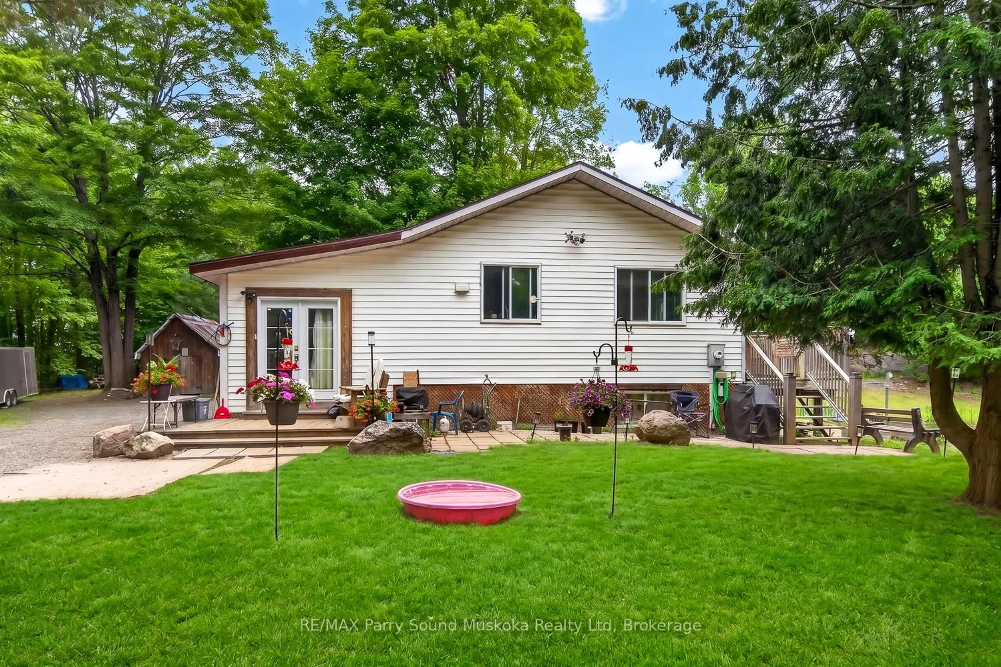 Home with vinyl exterior material, street for 15 Toronto Lake Rd, Georgian Bay Ontario P0C 1H0