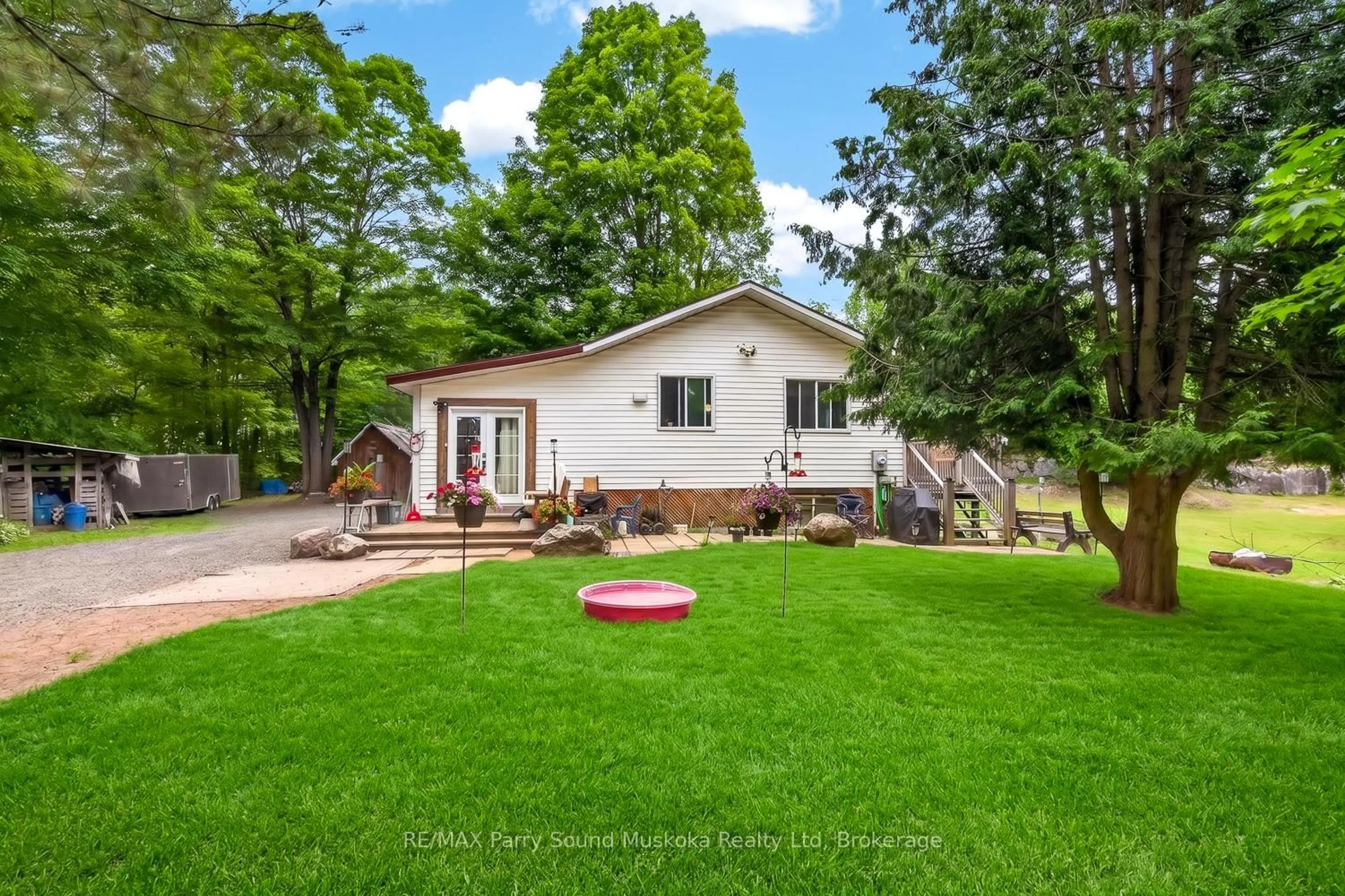 A pic from outside/outdoor area/front of a property/back of a property/a pic from drone, street for 15 Toronto Lake Rd, Georgian Bay Ontario P0C 1H0