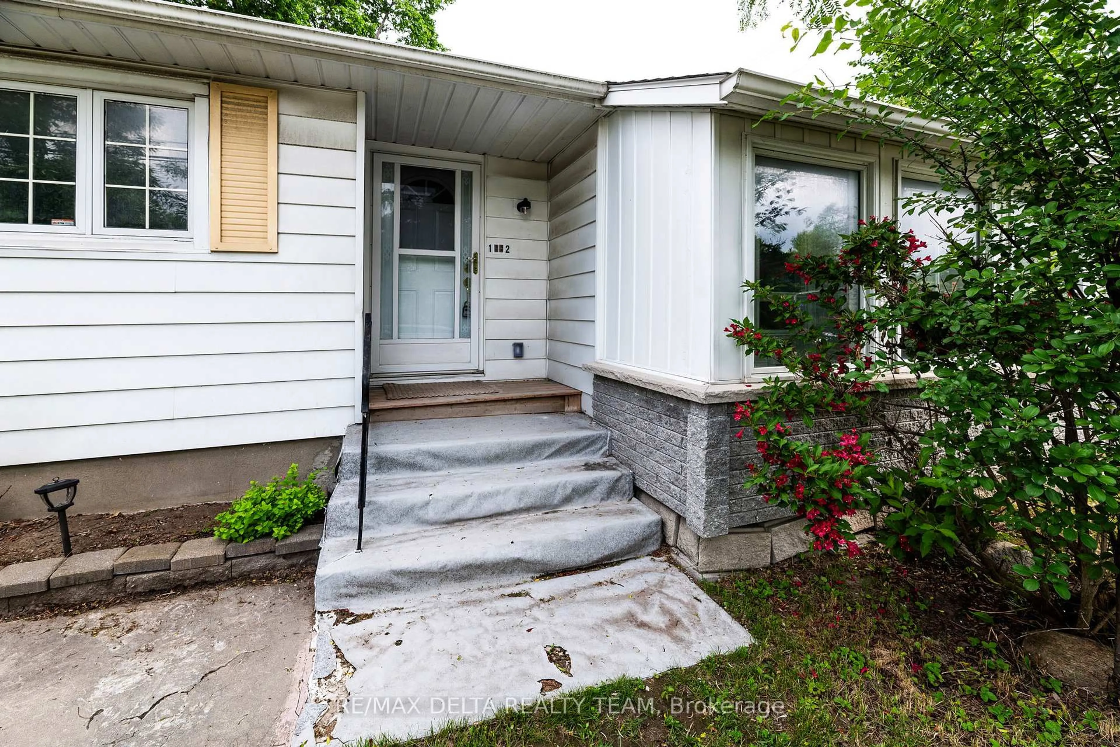 Home with vinyl exterior material, street for 2801 Baseline Rd, Ottawa Ontario K2H 7B6
