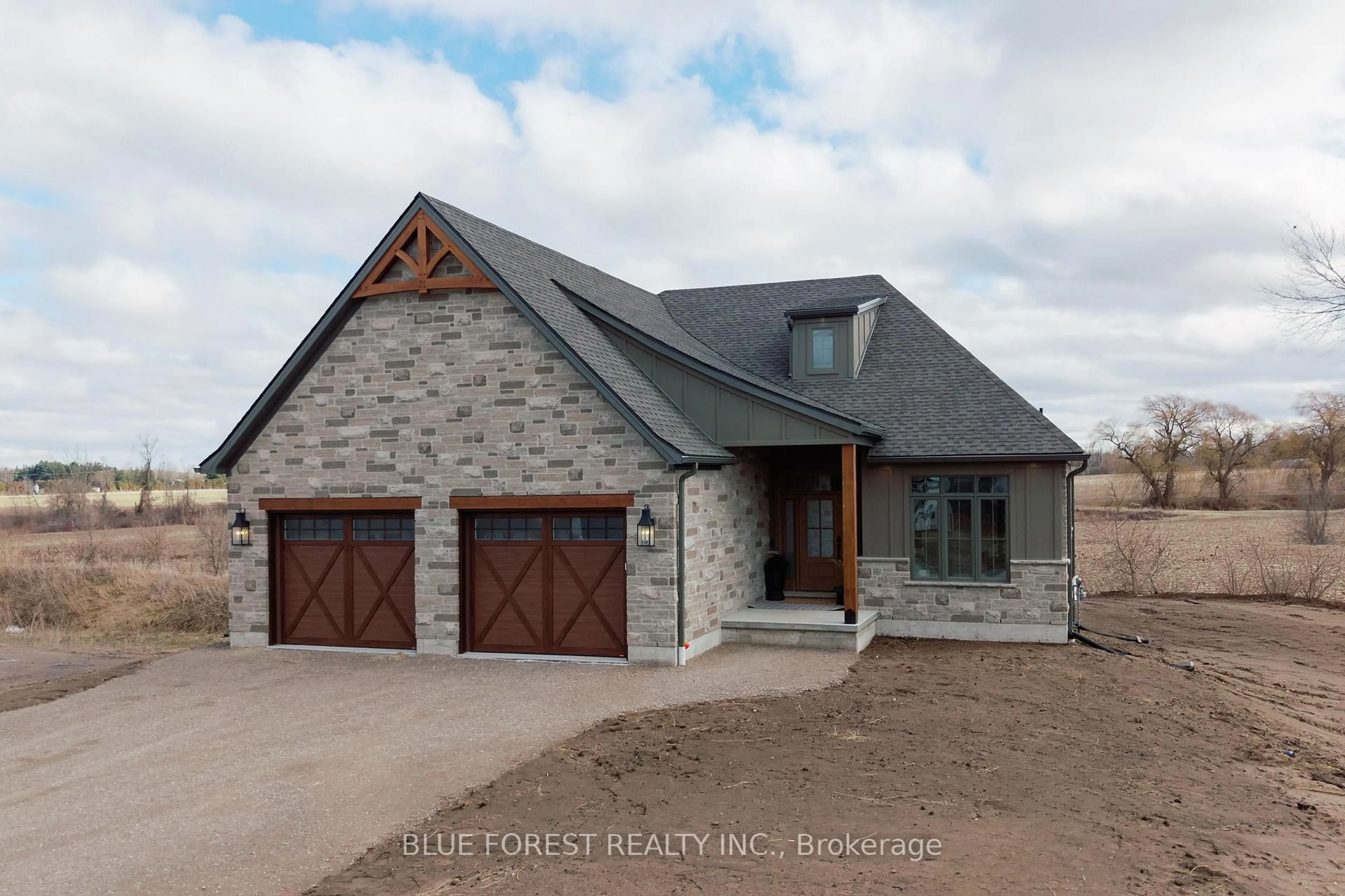 Home with brick exterior material, street for 225 Harvest Lane, Thames Centre Ontario N0L 1G2