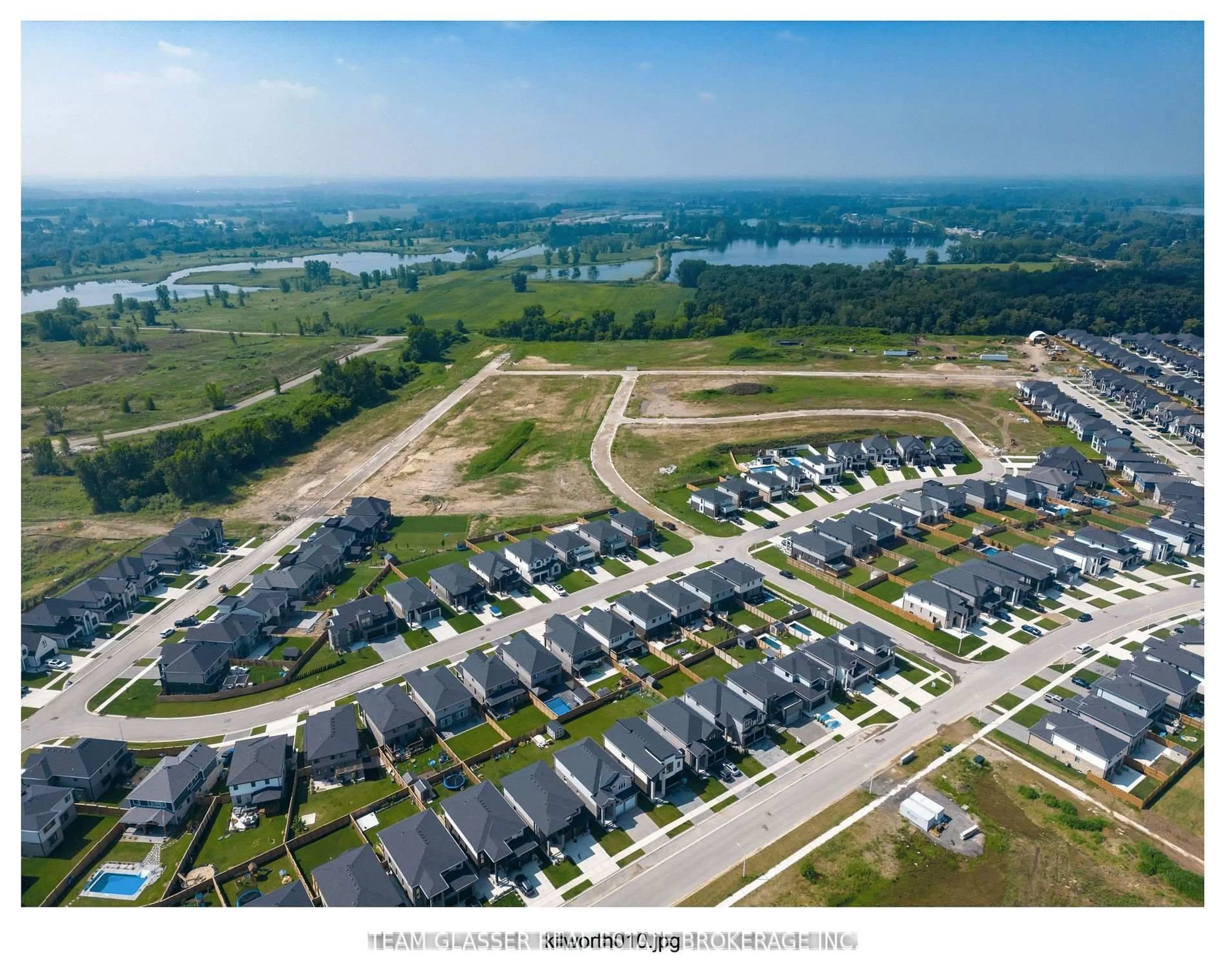 A pic from outside/outdoor area/front of a property/back of a property/a pic from drone, mountain view for 70 Benner Blvd, Middlesex Centre Ontario N0L 1R0