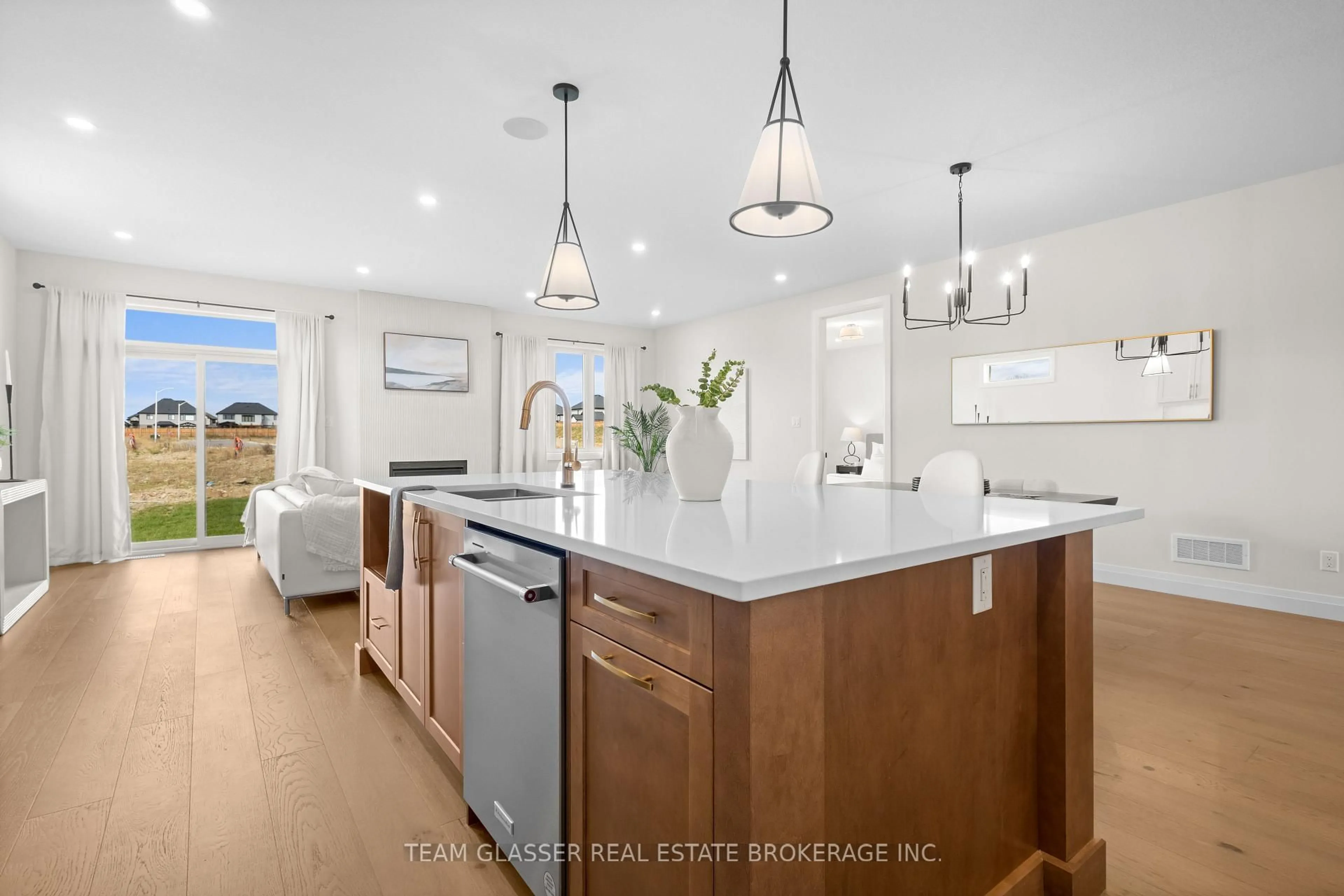 Open concept kitchen, ceramic/tile floor for 70 Benner Blvd, Middlesex Centre Ontario N0L 1R0