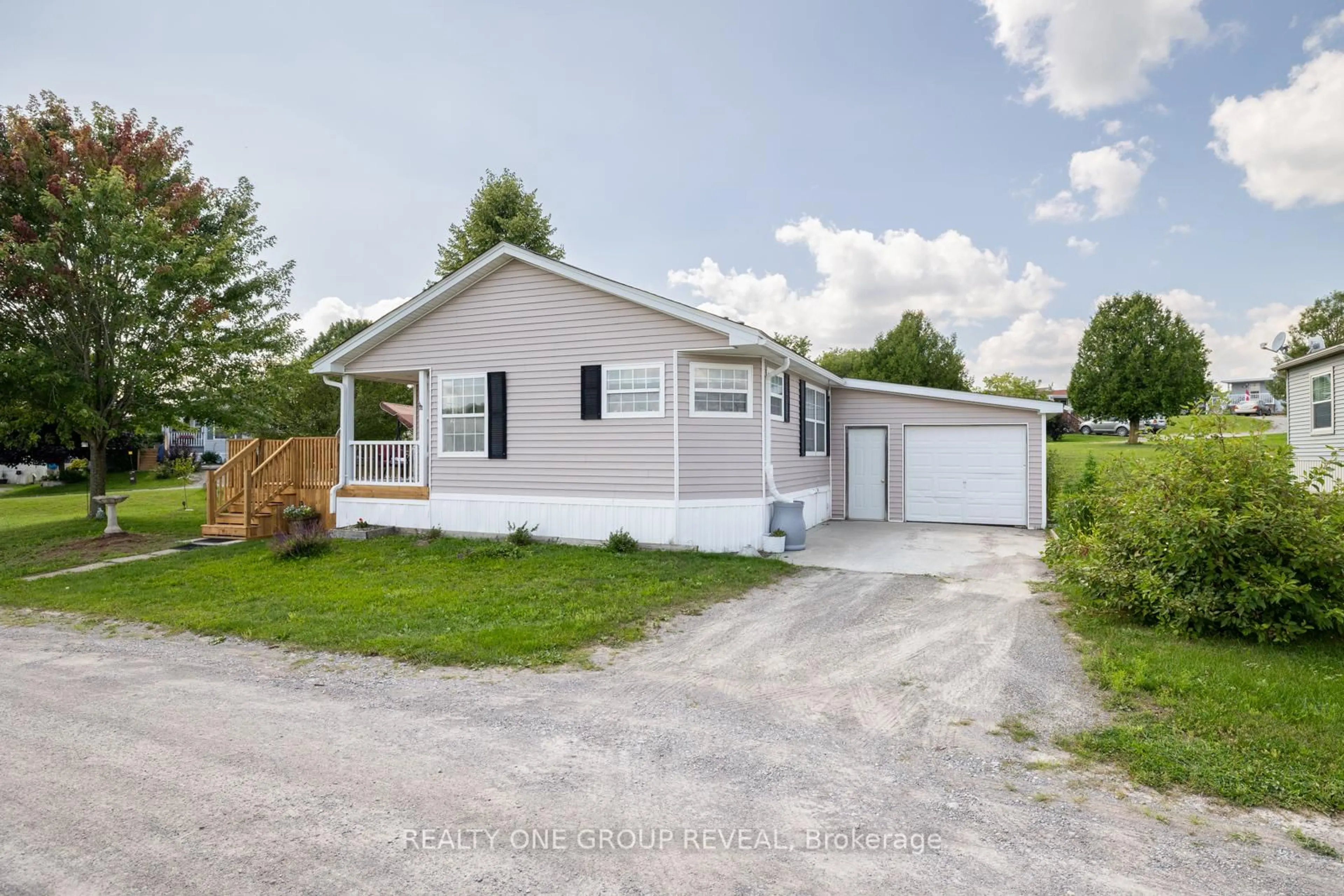 Home with vinyl exterior material, street for 152 Concession Road 11 Rd #37, Trent Hills Ontario K0L 1Y0