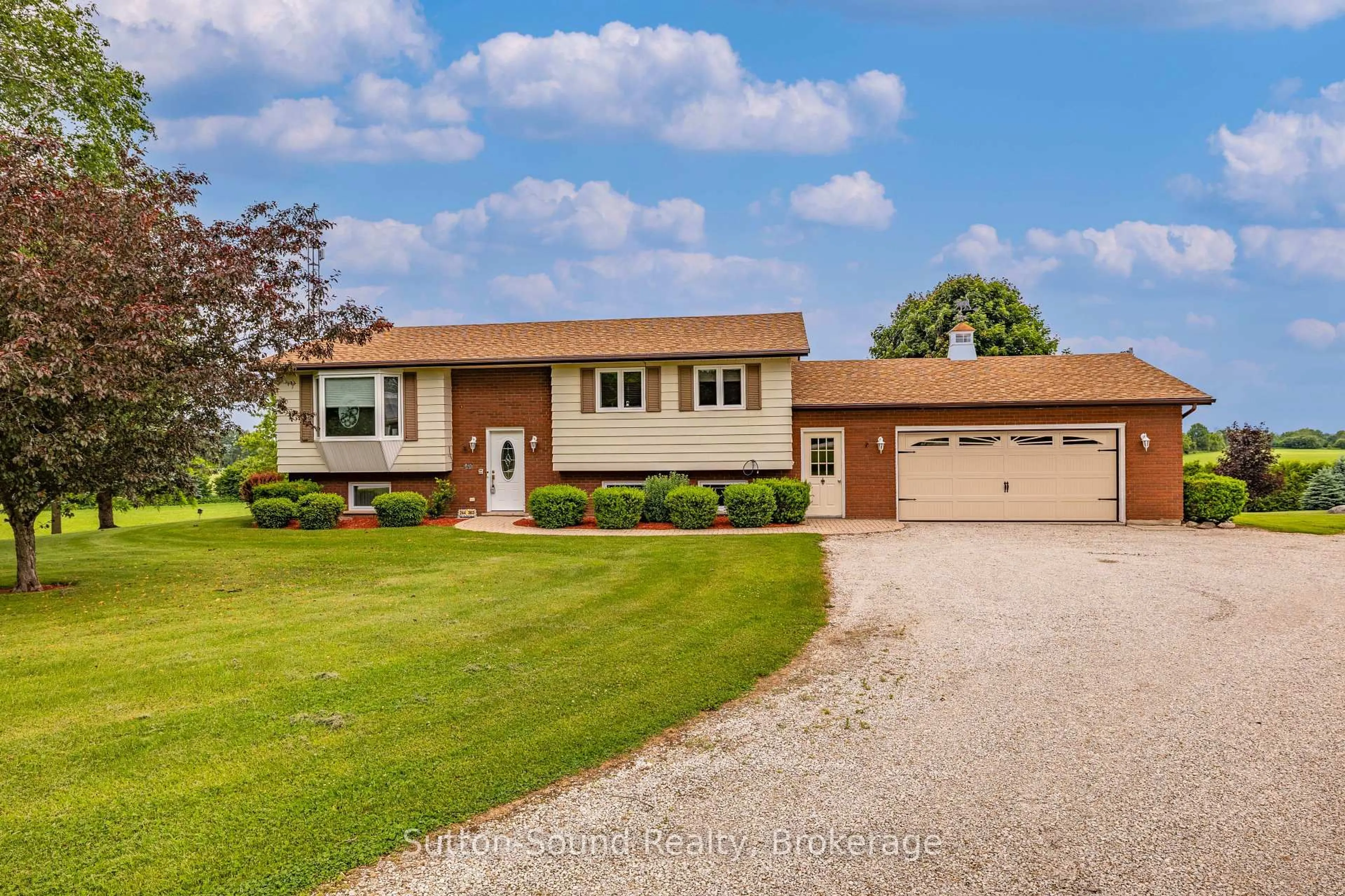 Home with vinyl exterior material, street for 244363 22 Sdrd, Meaford Ontario N4K 5W4