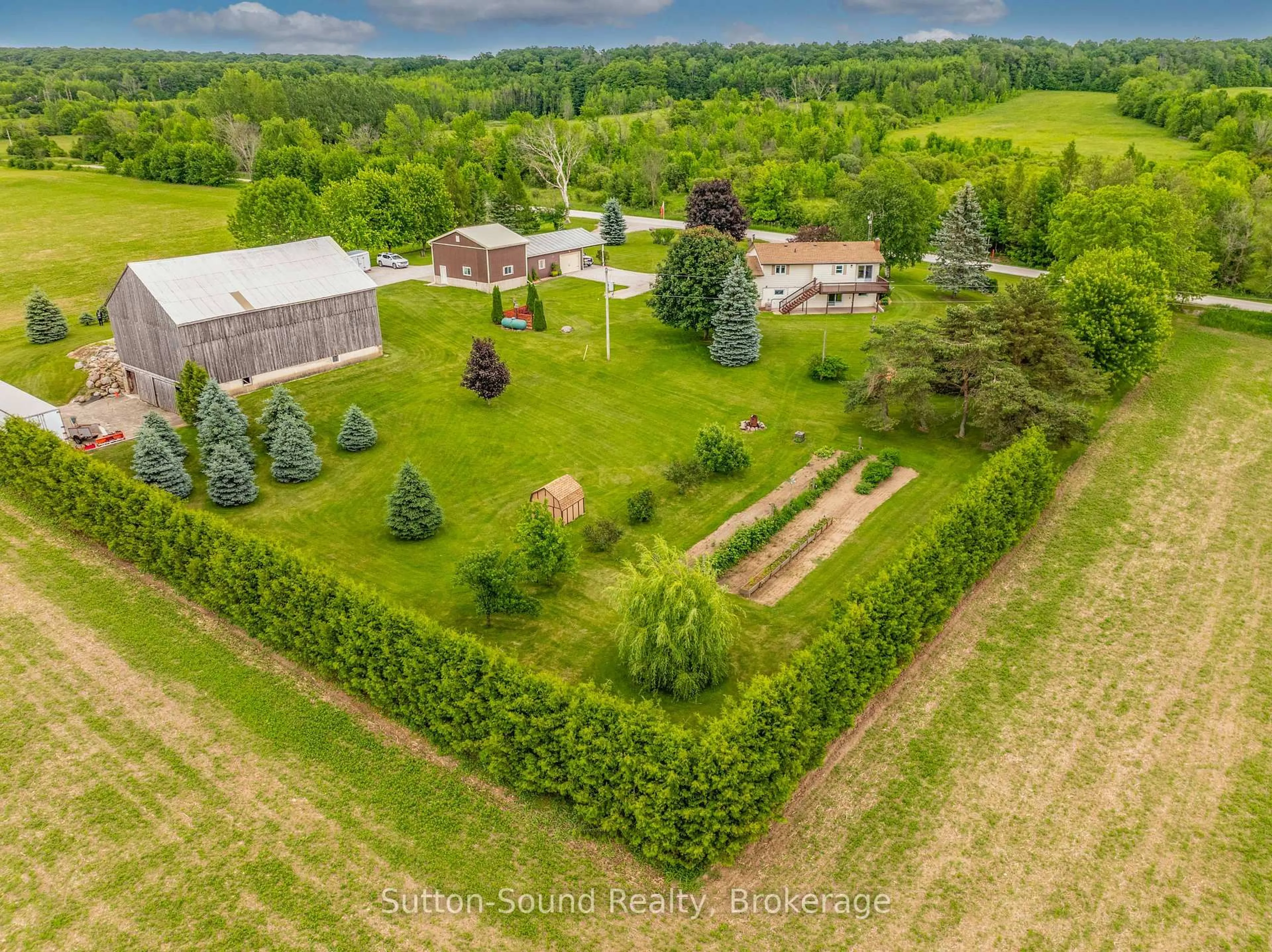 A pic from outside/outdoor area/front of a property/back of a property/a pic from drone, unknown for 244363 22 Sdrd, Meaford Ontario N4K 5W4