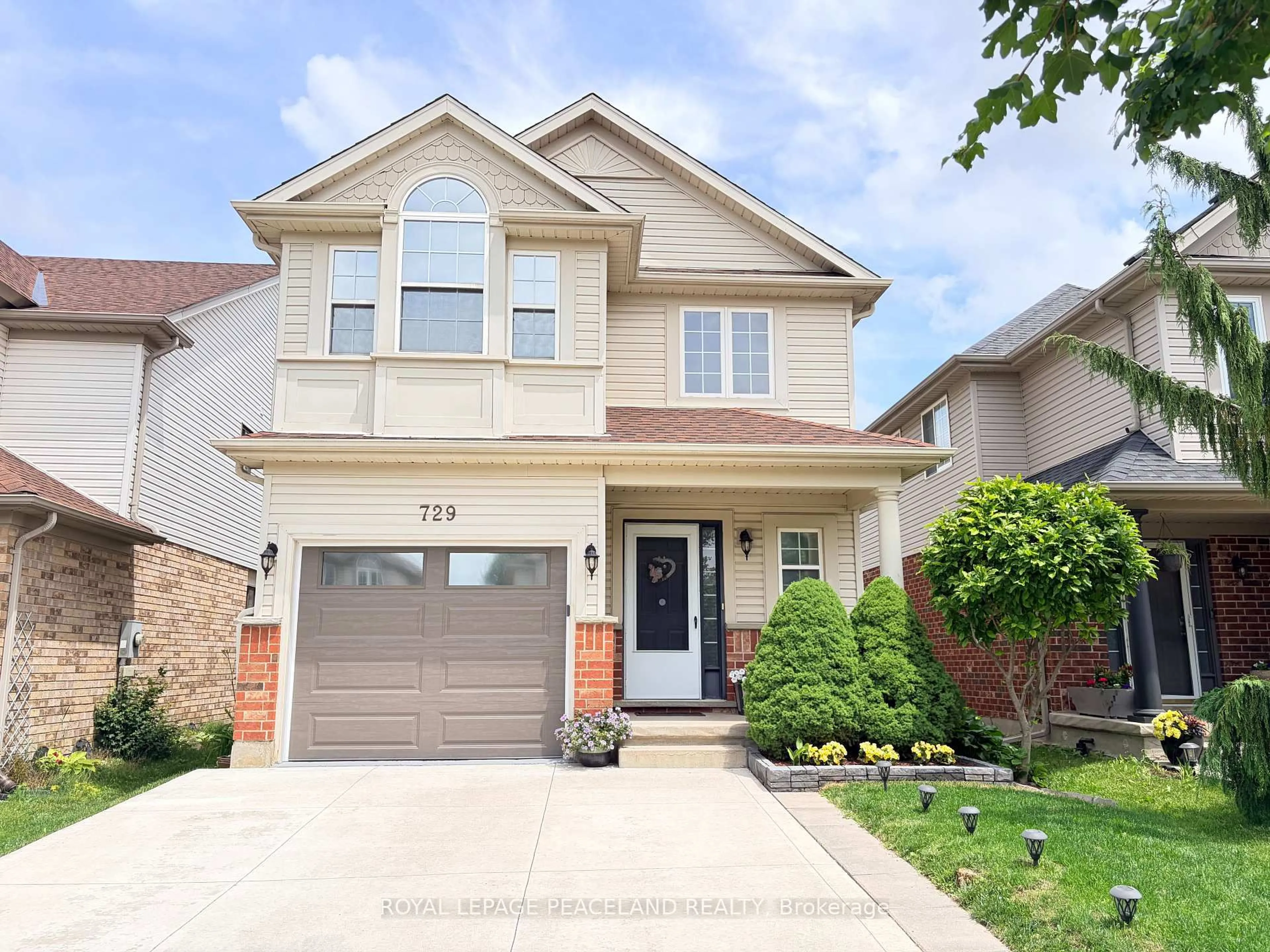 Home with brick exterior material, street for 729 Grand Banks Dr, Waterloo Ontario N2K 4M2