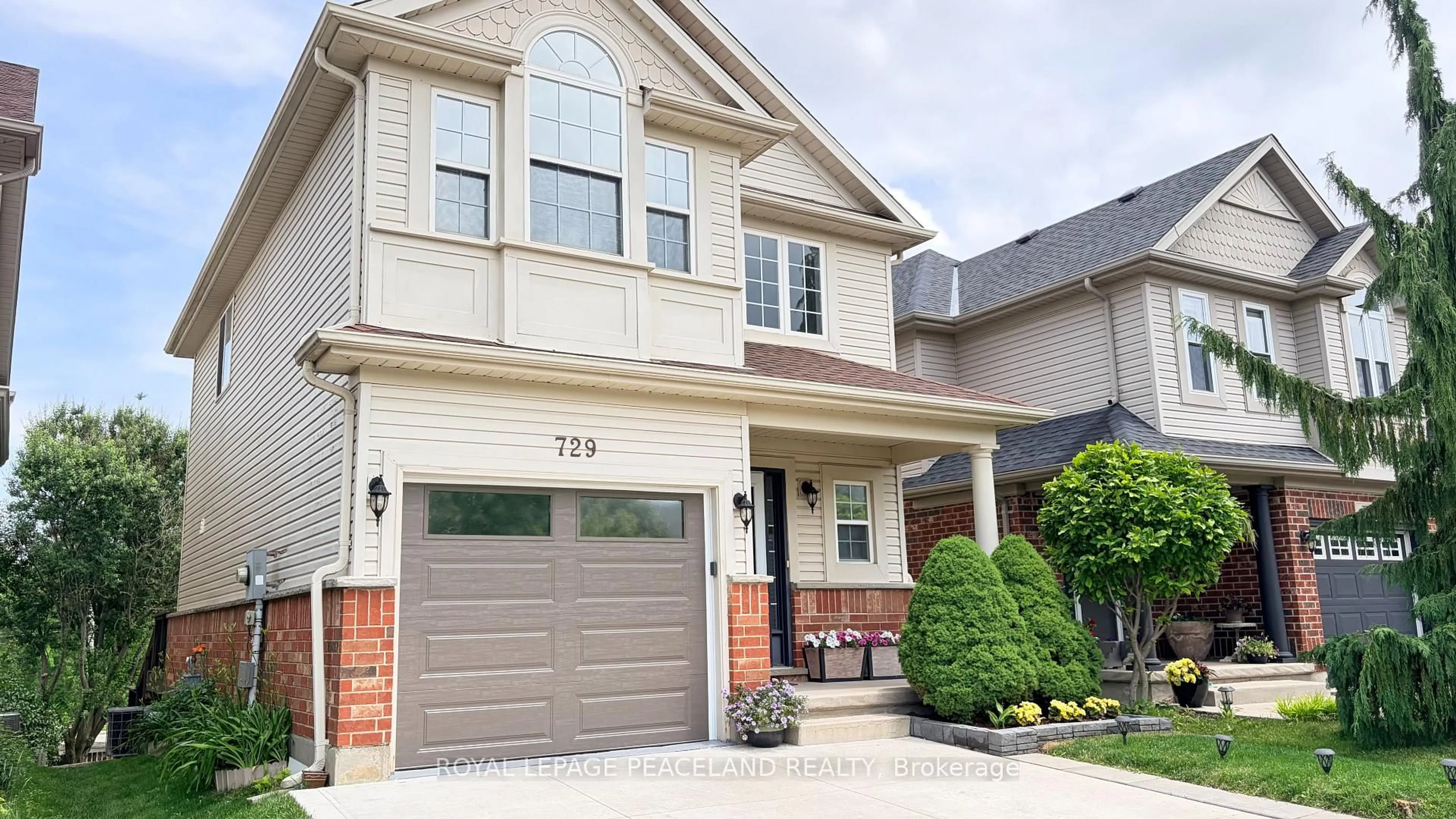 Home with brick exterior material, street for 729 Grand Banks Dr, Waterloo Ontario N2K 4M2