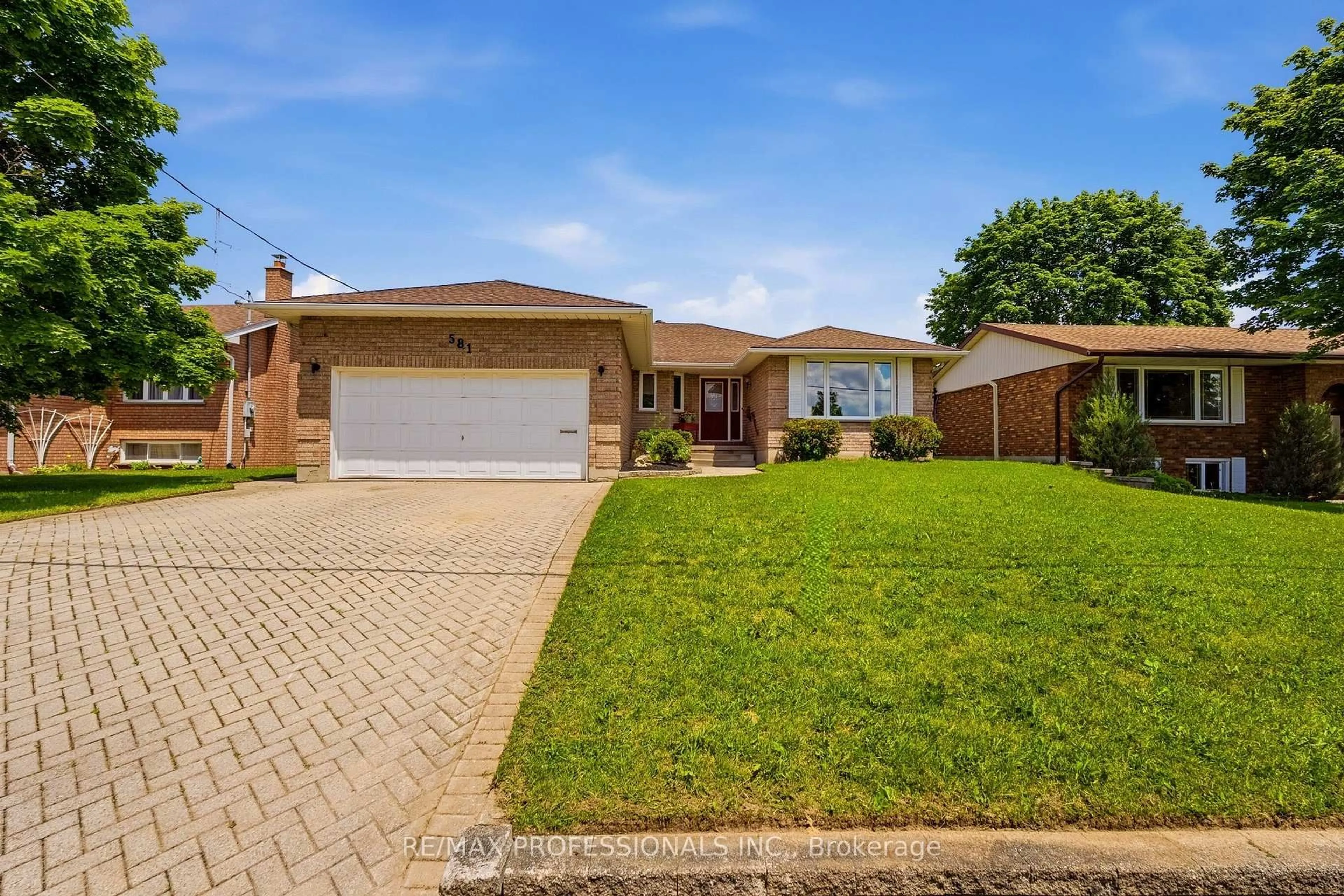 Home with brick exterior material, street for 581 21st Ave, Hanover Ontario N4N 3H2
