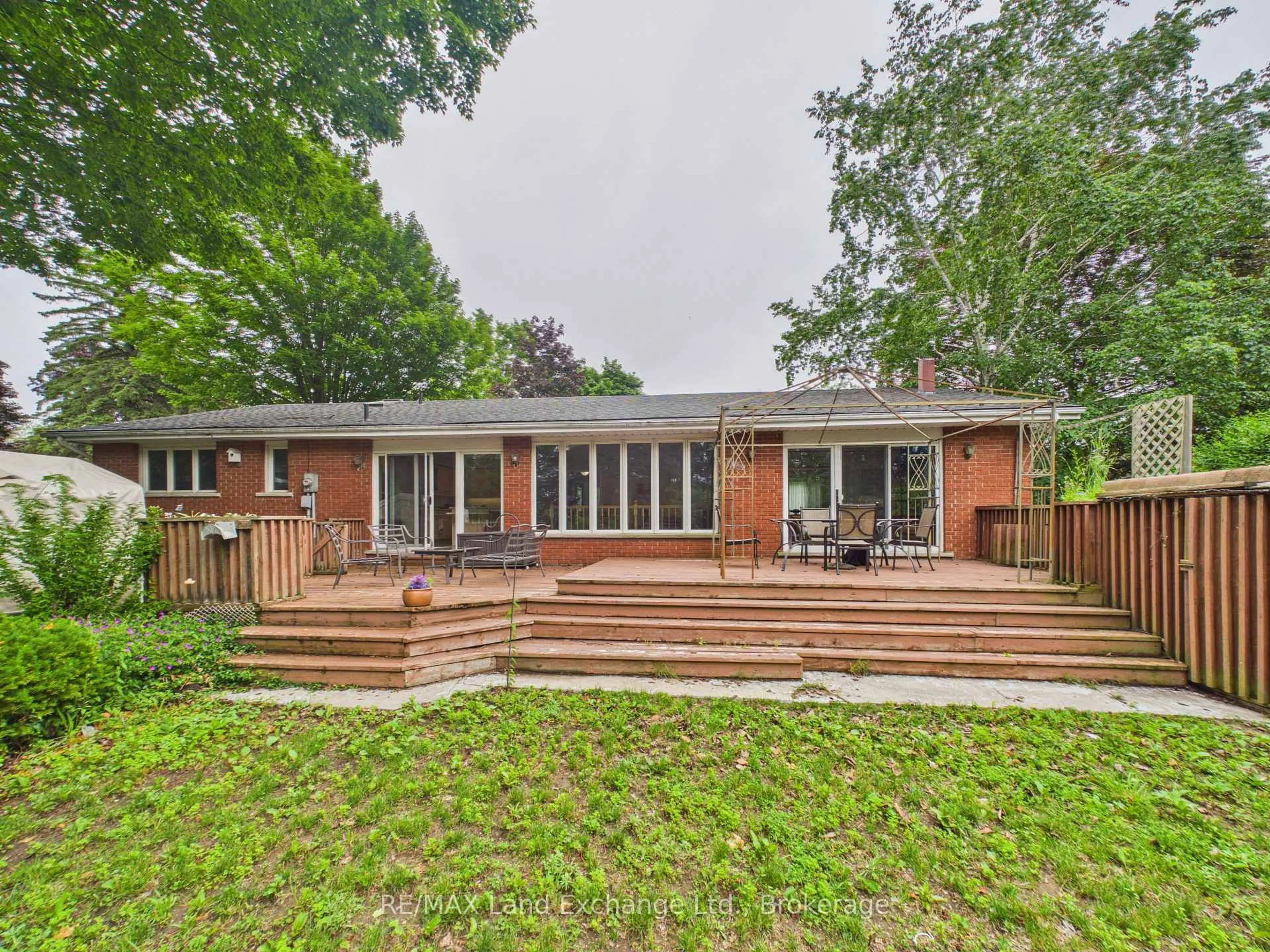 Home with brick exterior material, street for 28 Penetangore Row, Huron-Kinloss Ontario N2Z 2N7