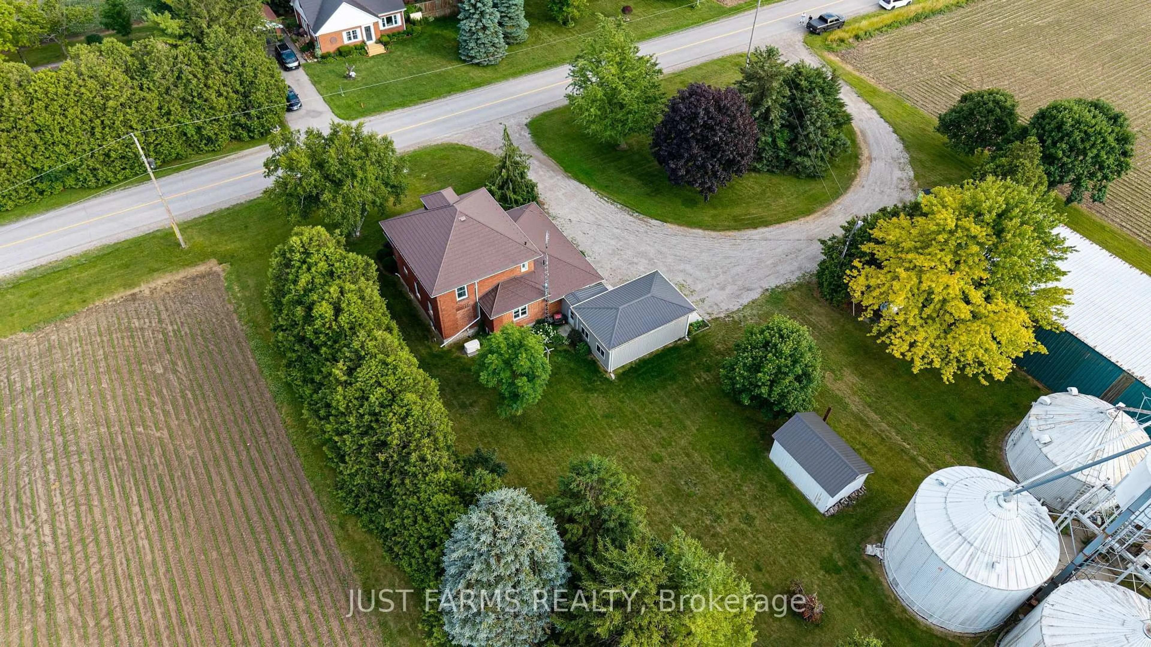 A pic from outside/outdoor area/front of a property/back of a property/a pic from drone, street for 8297 St. Andrew's Line, Chatham-Kent Ontario N7M 5J8