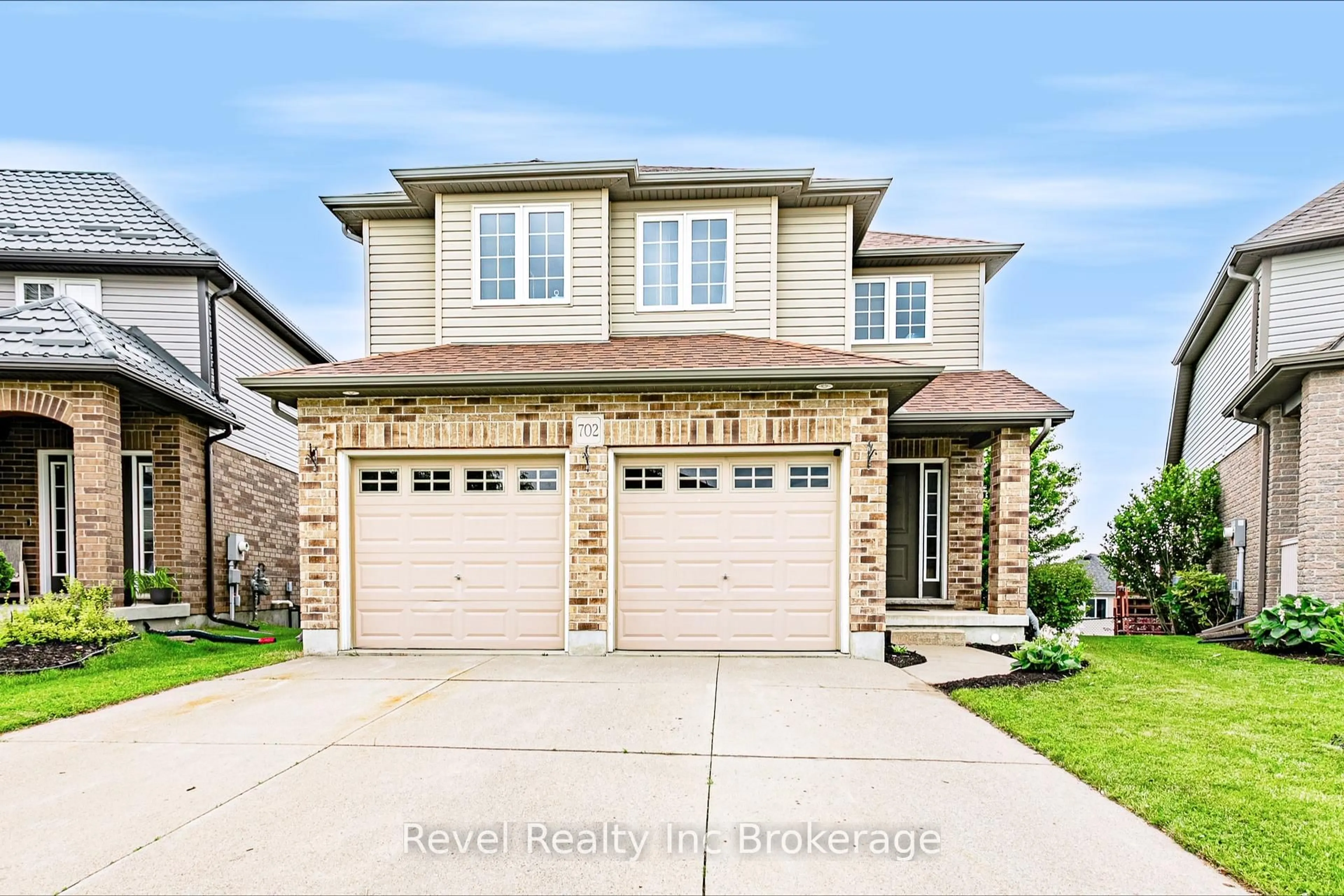 Home with brick exterior material, street for 702 Frontenac Cres, Woodstock Ontario N4V 0B1
