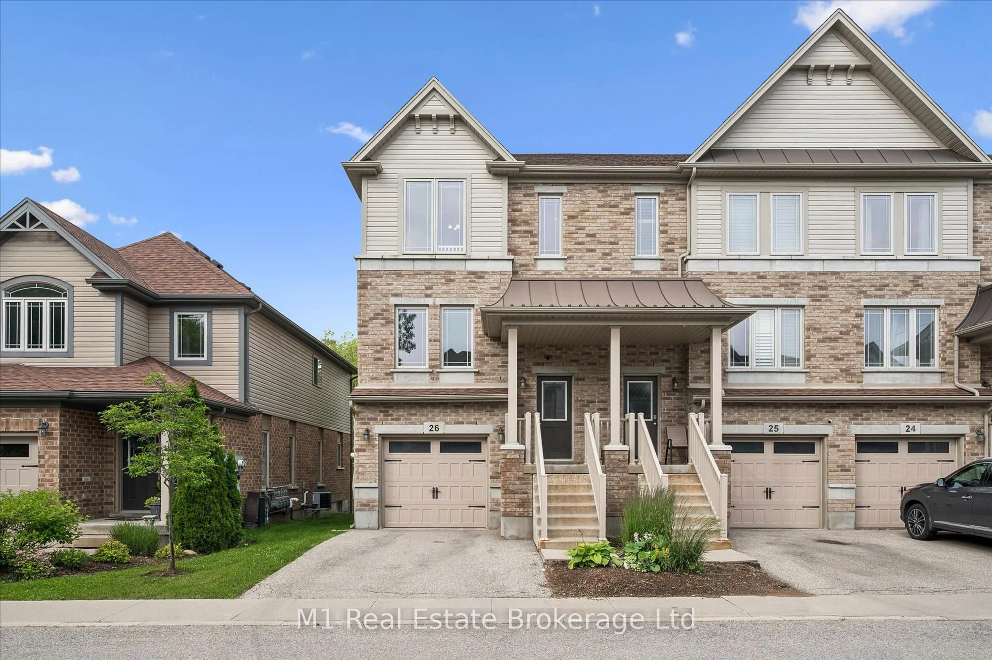 Home with brick exterior material, street for 66 Eastview Rd #26, Guelph Ontario N1E 0N1