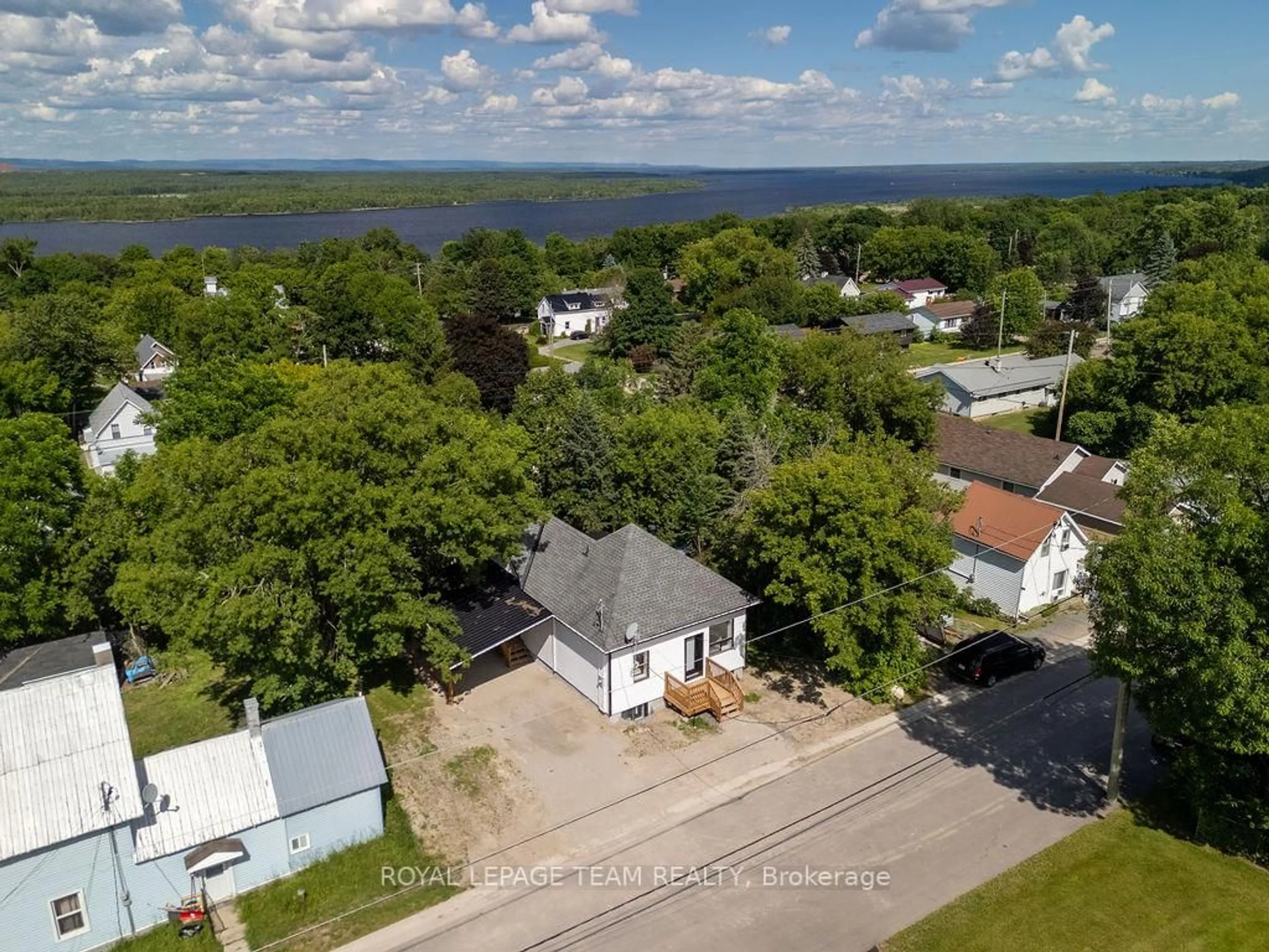 A pic from outside/outdoor area/front of a property/back of a property/a pic from drone, water/lake/river/ocean view for 29 Gillies St, Braeside Ontario K0A 1G0