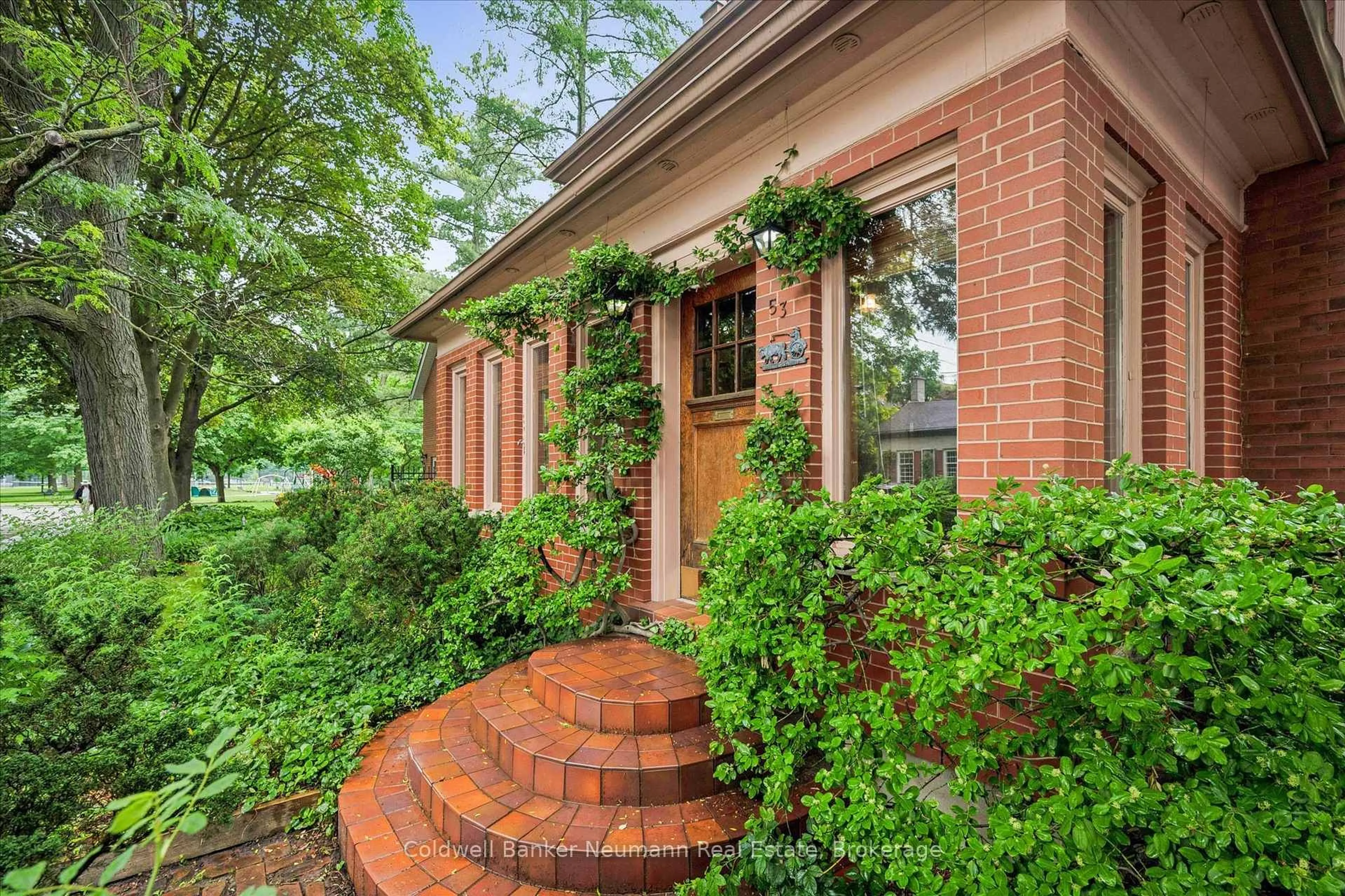 Home with brick exterior material, street for 53 Hillcrest Dr, Guelph Ontario N1E 4W8