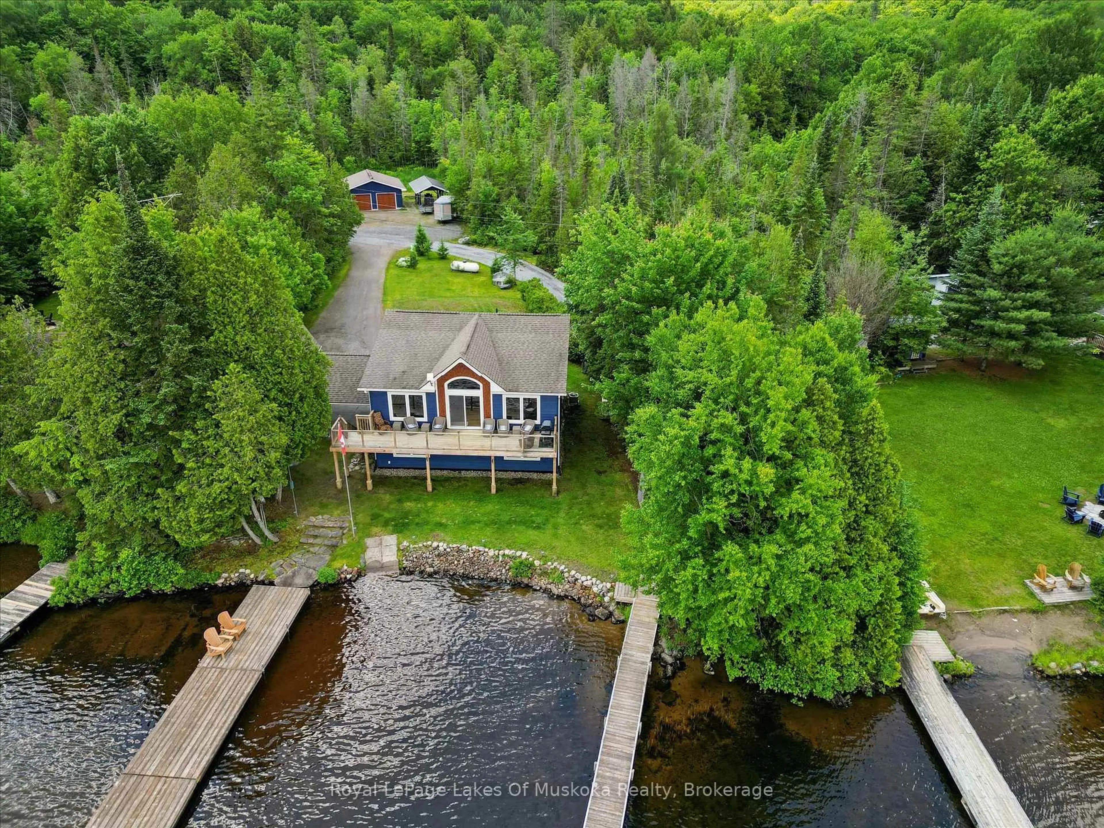A pic from outside/outdoor area/front of a property/back of a property/a pic from drone, water/lake/river/ocean view for 44 Hillcrest Lane, Perry Ontario P0A 1J0