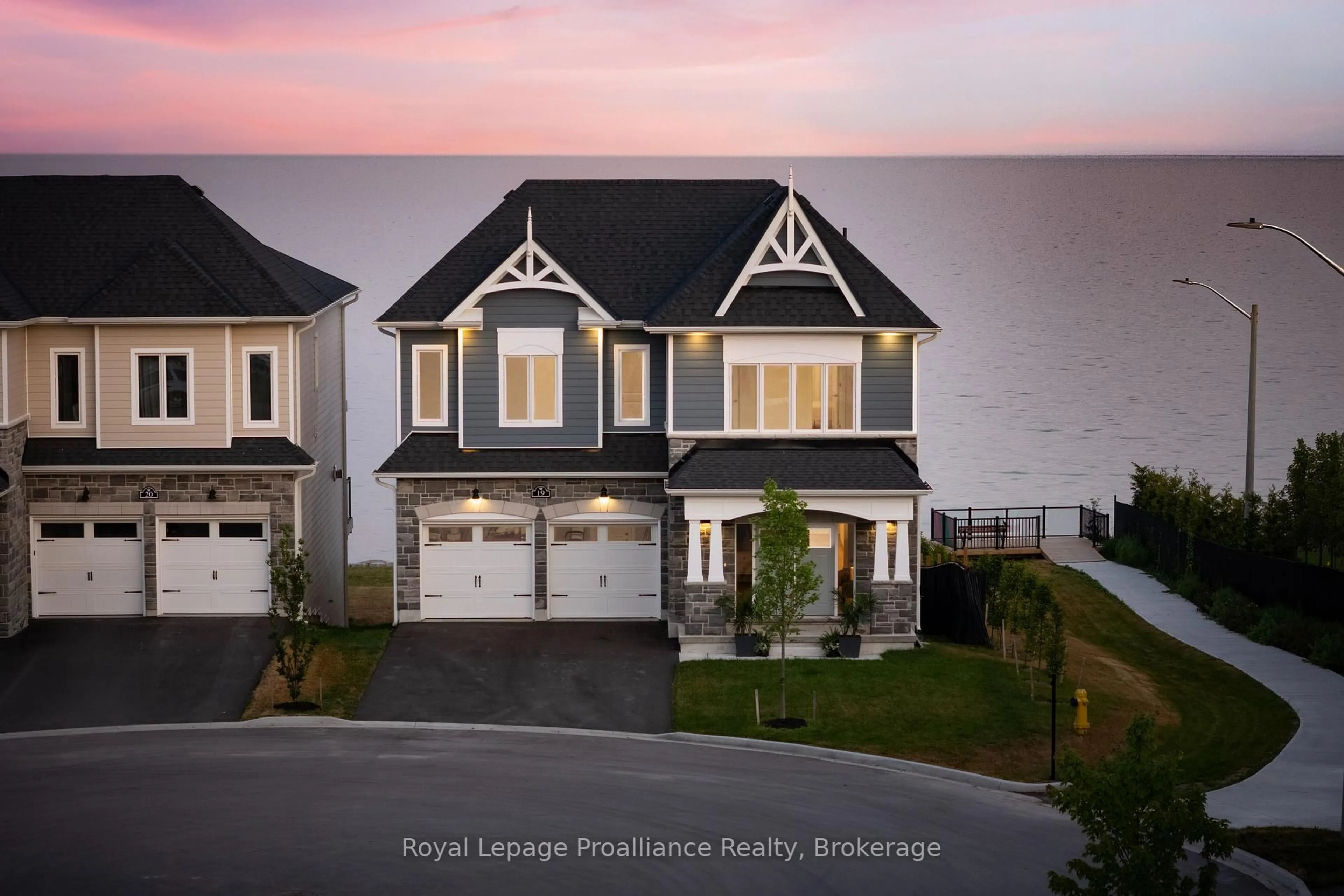 A pic from outside/outdoor area/front of a property/back of a property/a pic from drone, water/lake/river/ocean view for 19 Twelve Trees Crt, Prince Edward County Ontario K0K 3L0