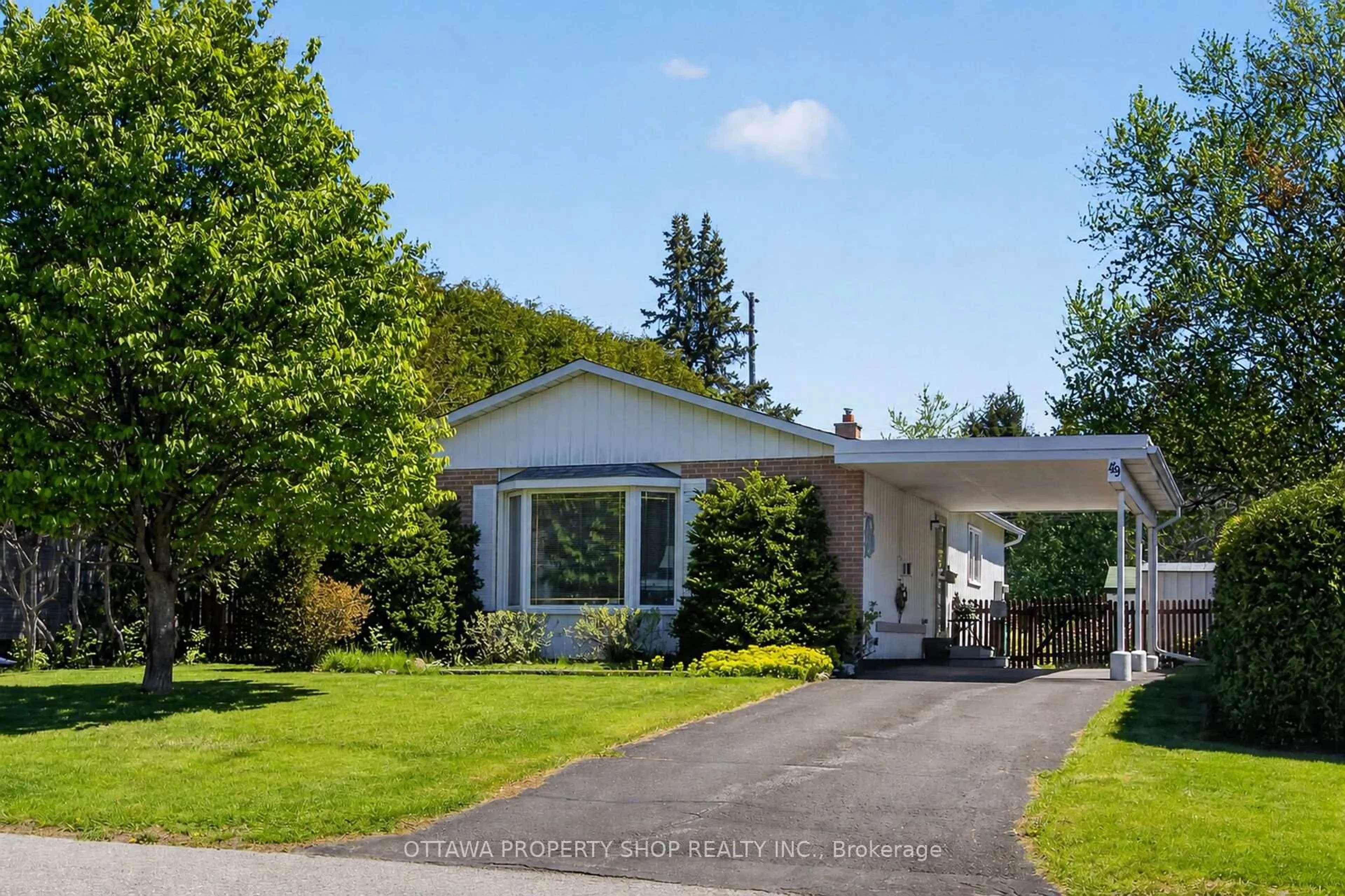 Home with vinyl exterior material, street for 49 Country Lane, Ottawa Ontario K2L 1H9