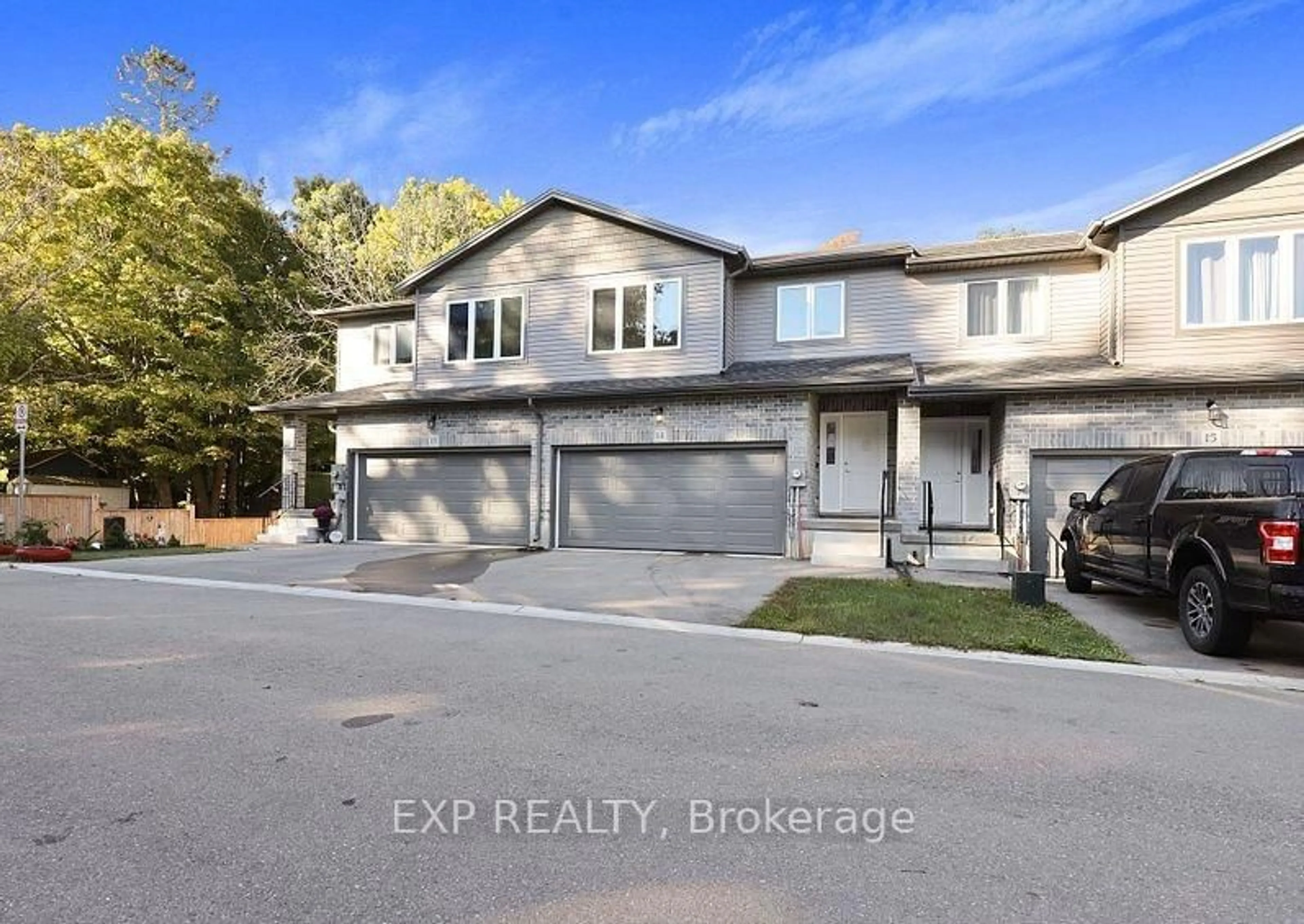 A pic from outside/outdoor area/front of a property/back of a property/a pic from drone, street for 61 Vienna Rd #14, Tillsonburg Ontario N4G 0J6