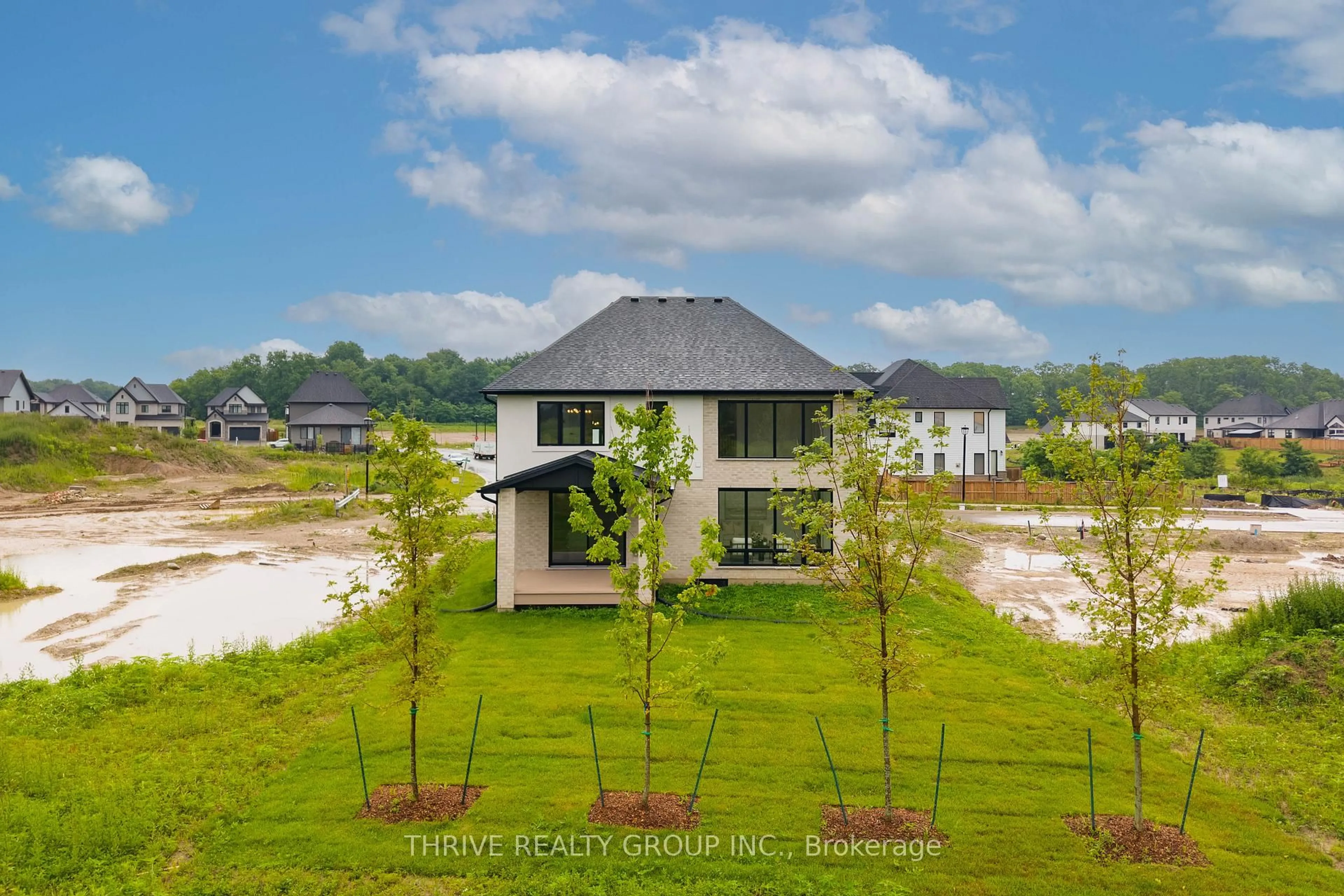A pic from outside/outdoor area/front of a property/back of a property/a pic from drone, water/lake/river/ocean view for 4067 Fallingbrook Rd, London South Ontario N6P 0H7