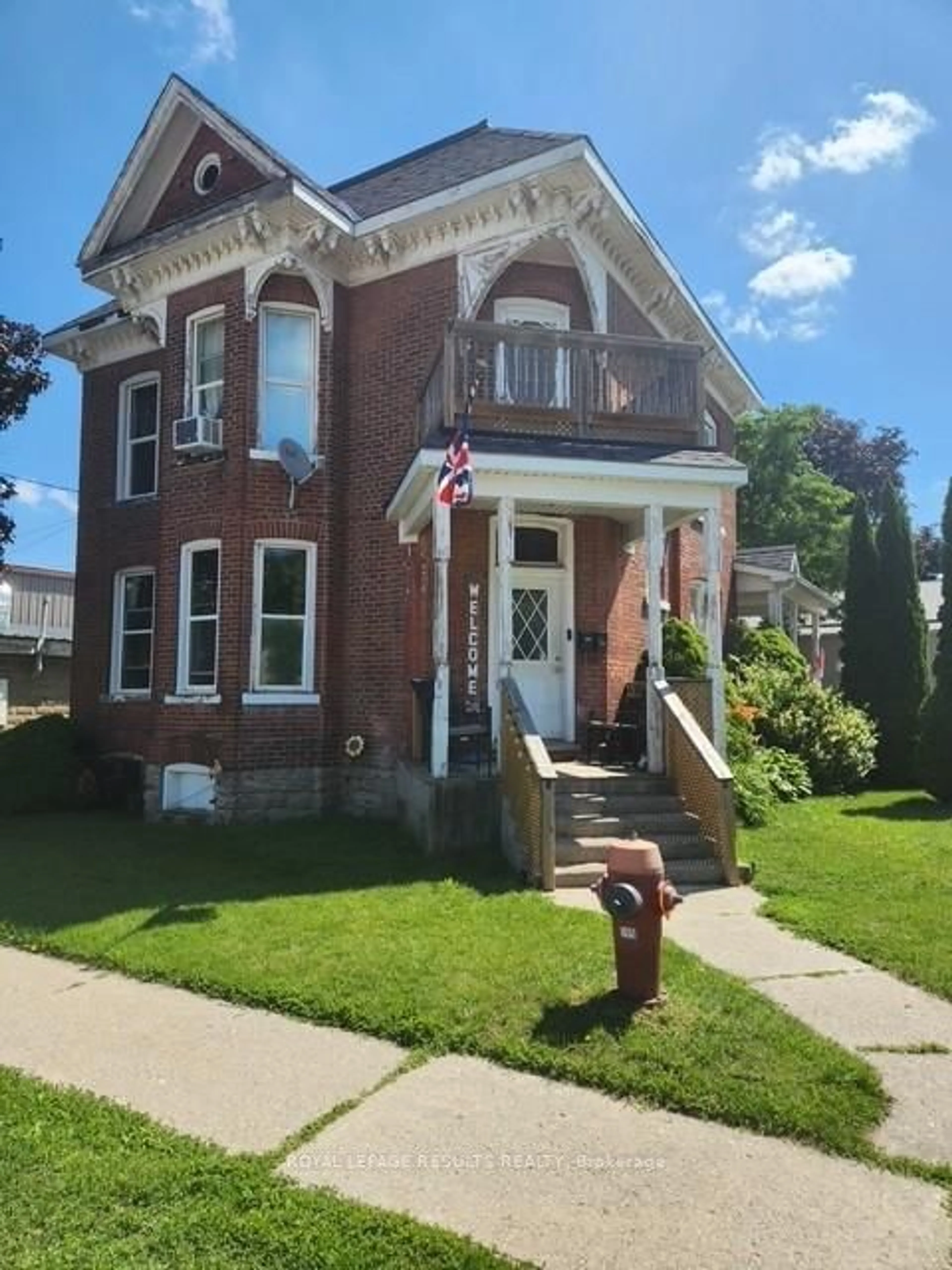 Home with brick exterior material, street for 89 Sydenham St #87-89, Aylmer Ontario N5H 1L4