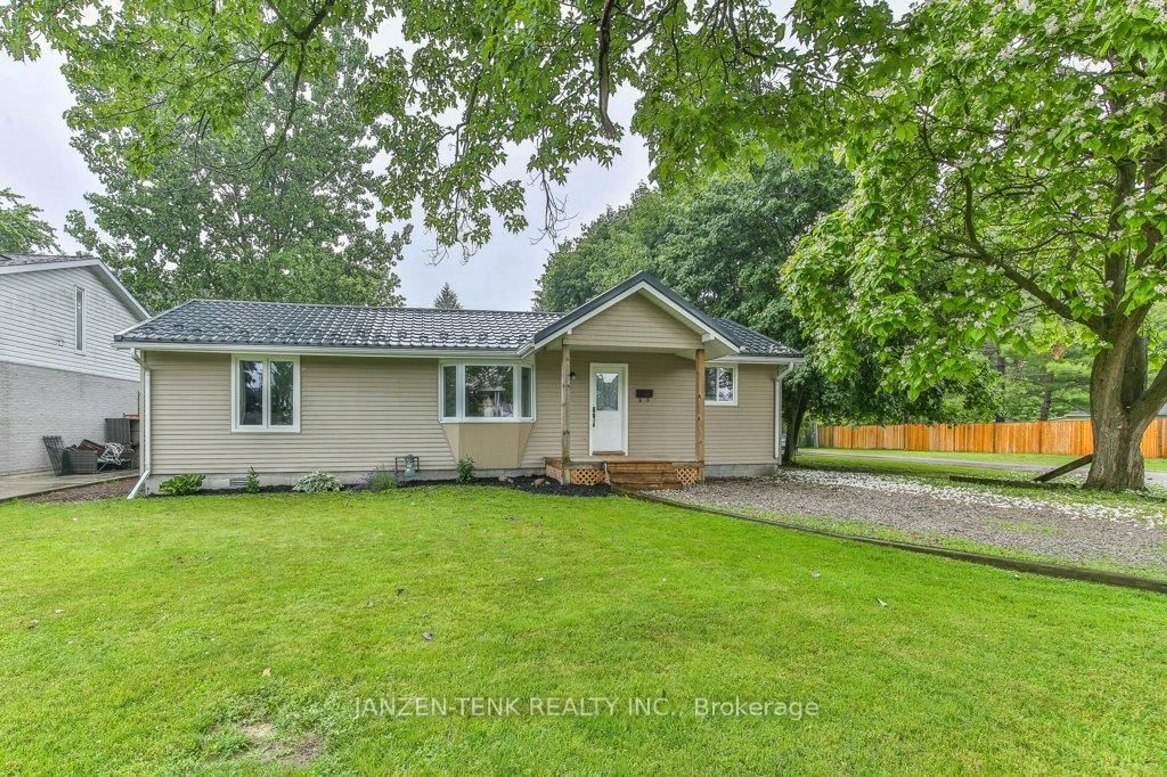 Home with vinyl exterior material, street for 11793 Springfield Rd, Malahide Ontario N0L 2J0