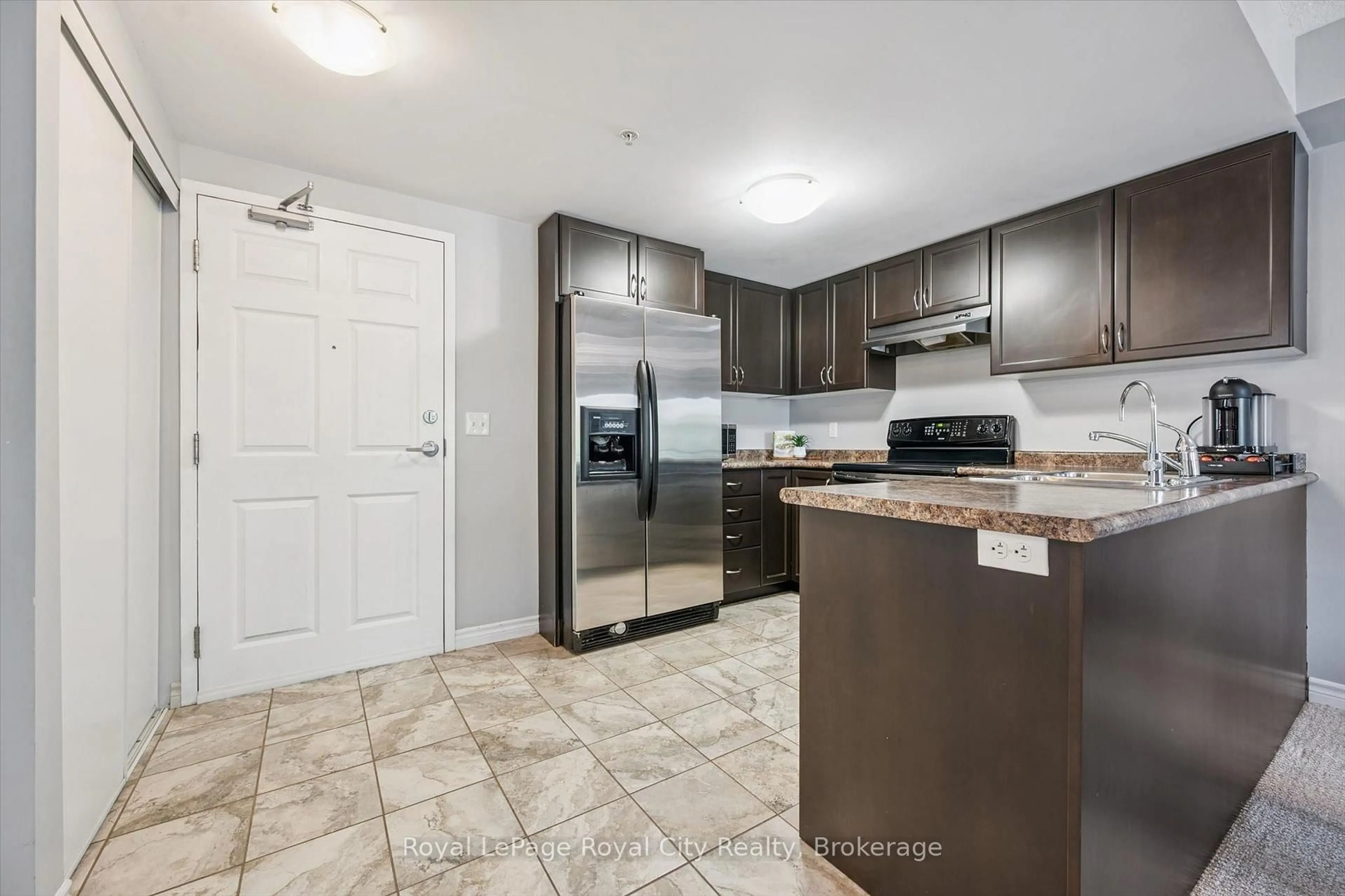 Standard kitchen, ceramic/tile floor for 67 Kingsbury Sq #111, Guelph Ontario N1L 0L3