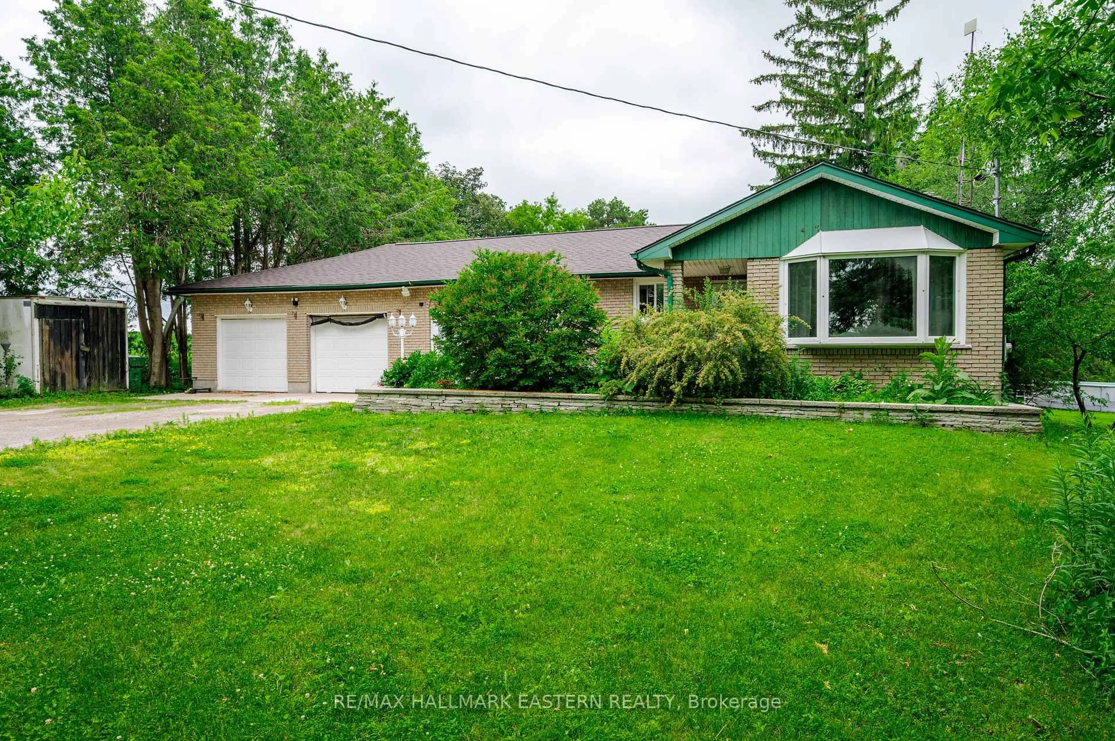 A pic from outside/outdoor area/front of a property/back of a property/a pic from drone, street for 785 Highway 35, Kawartha Lakes Ontario L0A 1K0