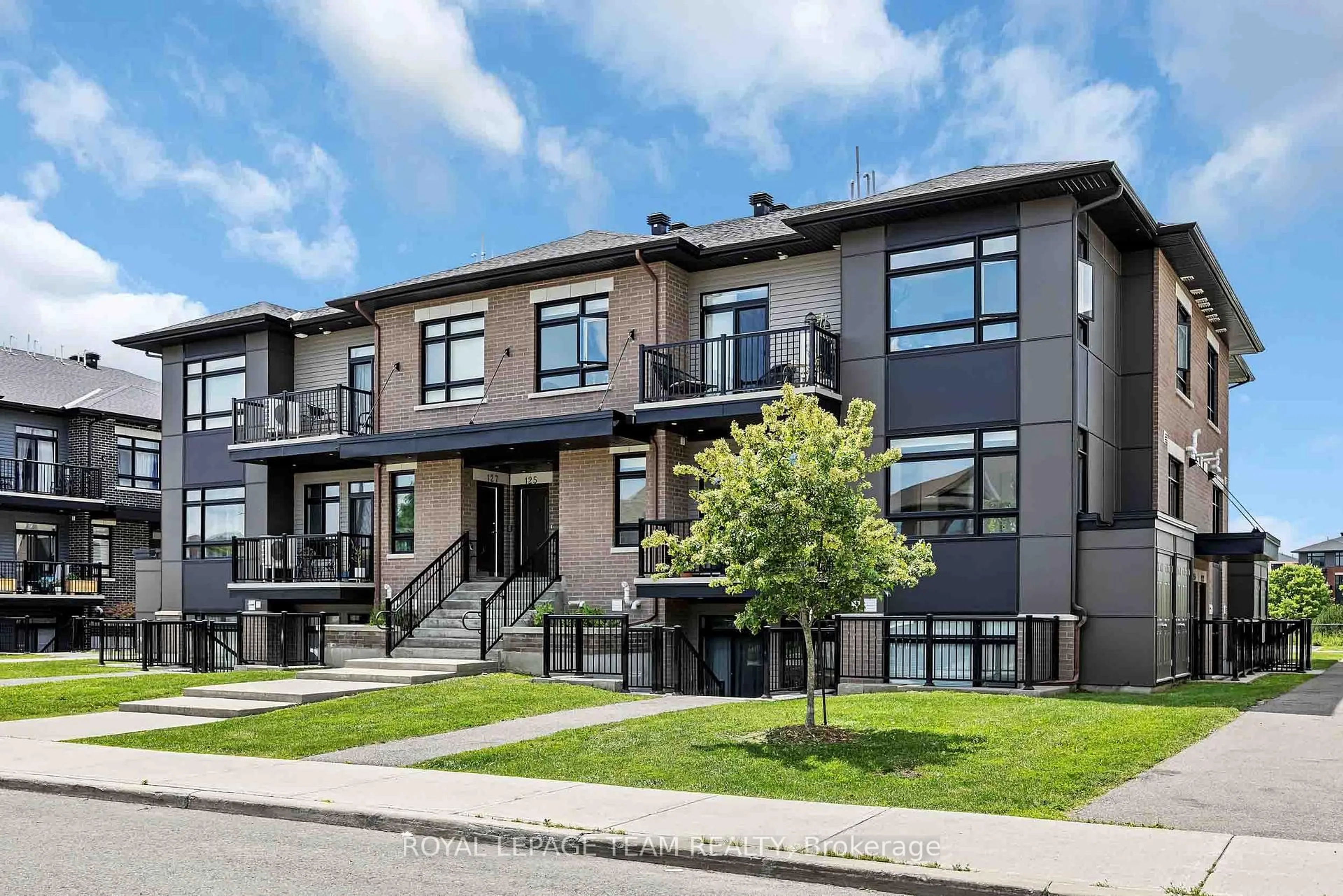 Home with brick exterior material, street for 121 Fairweather St, Ottawa Ontario K1T 0M8