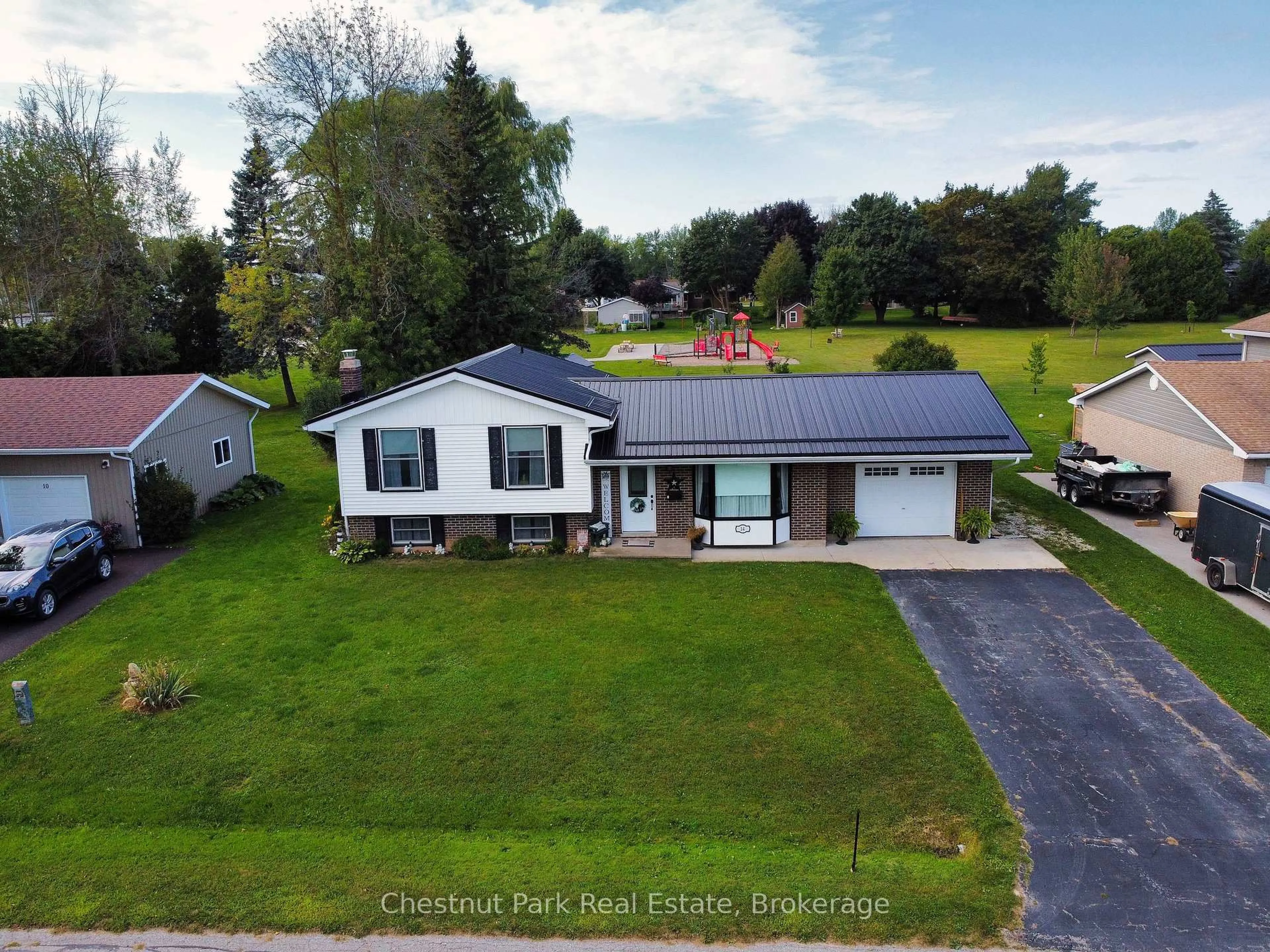 A pic from outside/outdoor area/front of a property/back of a property/a pic from drone, street for 14 Tower Rd, Arran-Elderslie Ontario N0G 1L0
