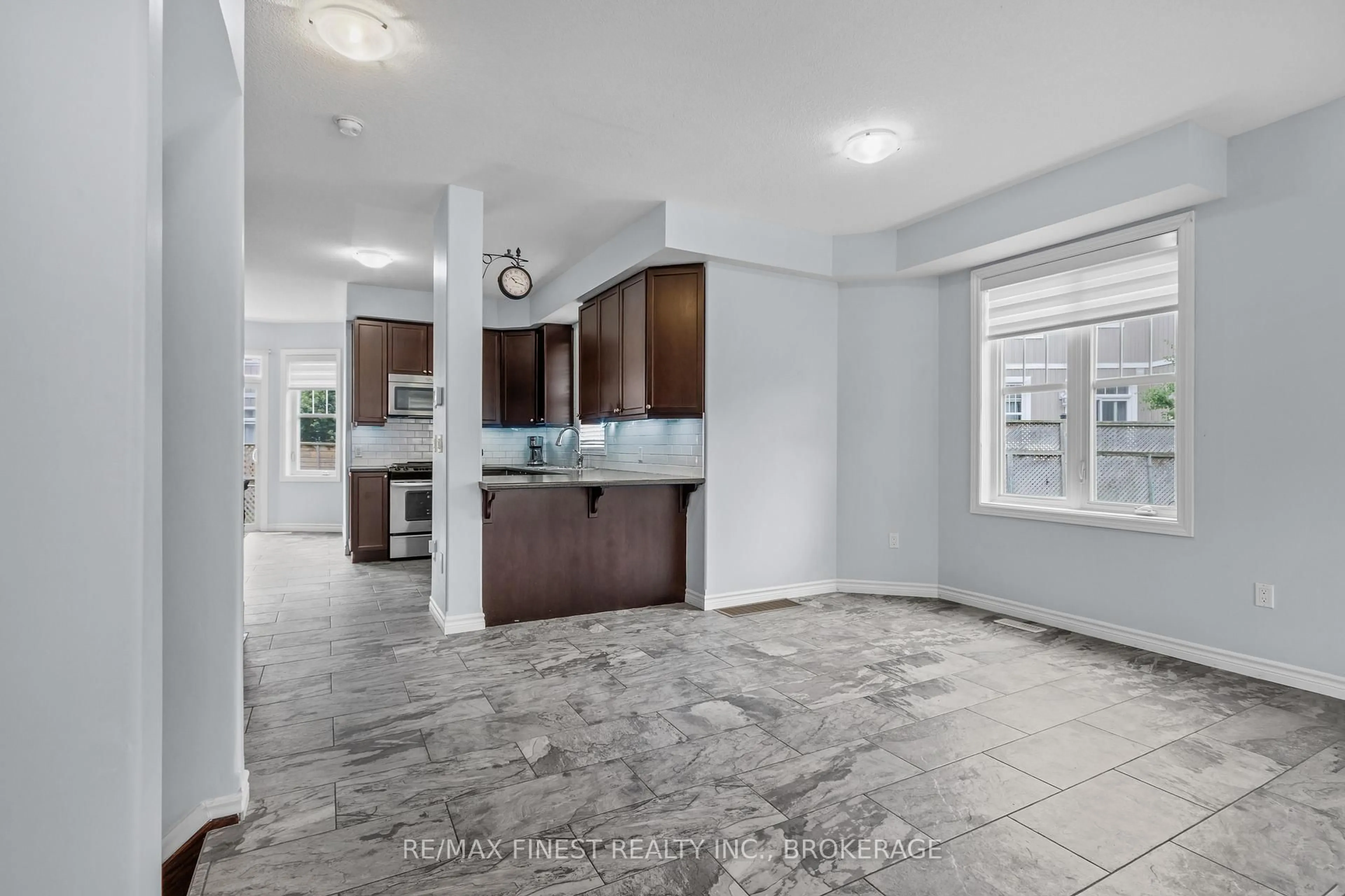 Open concept kitchen, ceramic/tile floor for 893 Ascot Lane, Kingston Ontario K7K 0C8