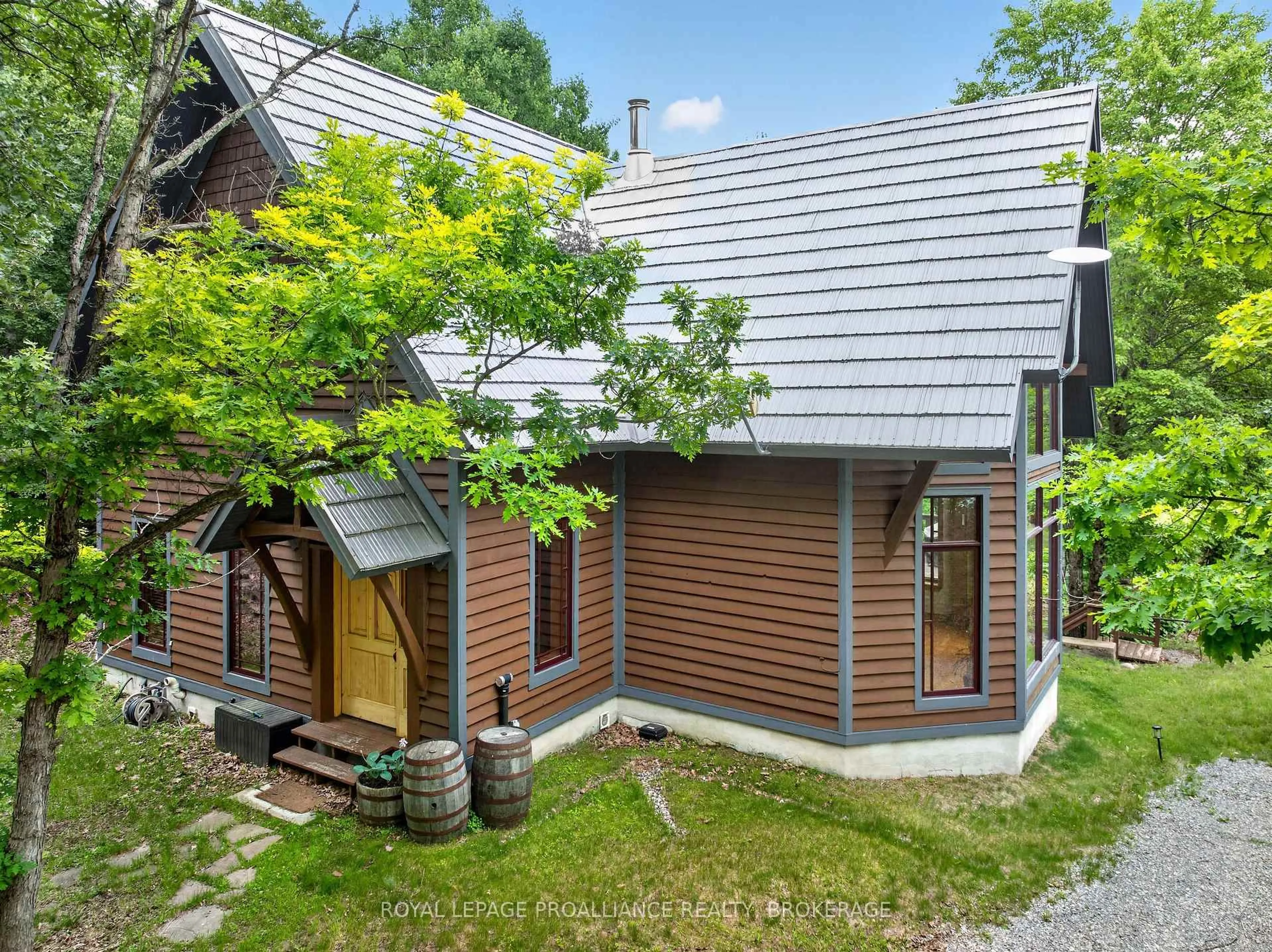 A pic from outside/outdoor area/front of a property/back of a property/a pic from drone, street for 488 Gull Creek Lane, Tamworth Ontario K0K 3G0