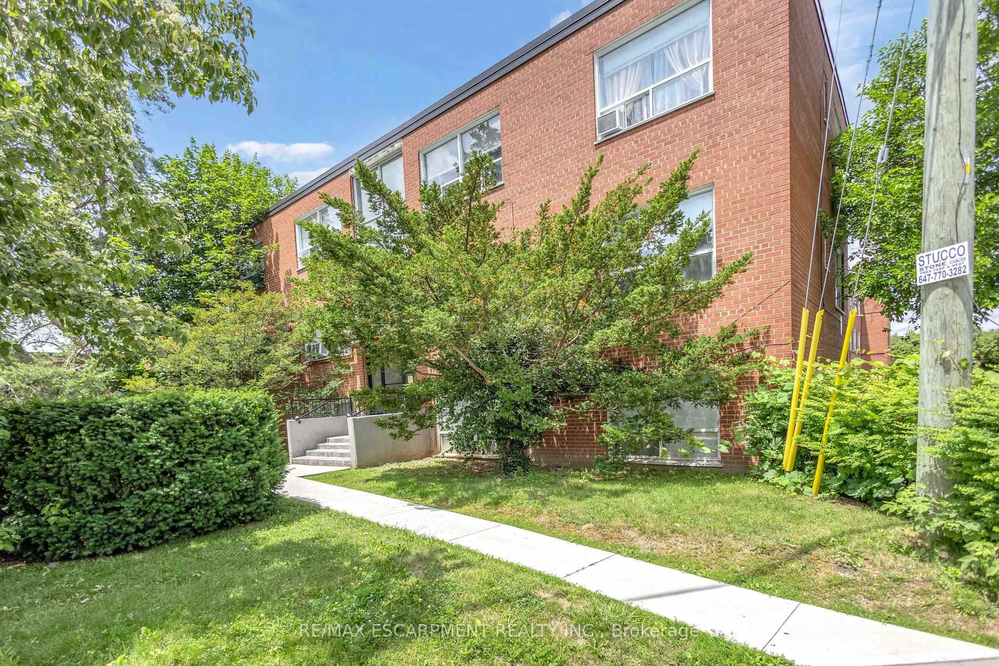 Home with brick exterior material, unknown for 57 Mericourt Rd #302, Hamilton Ontario L8S 2N5