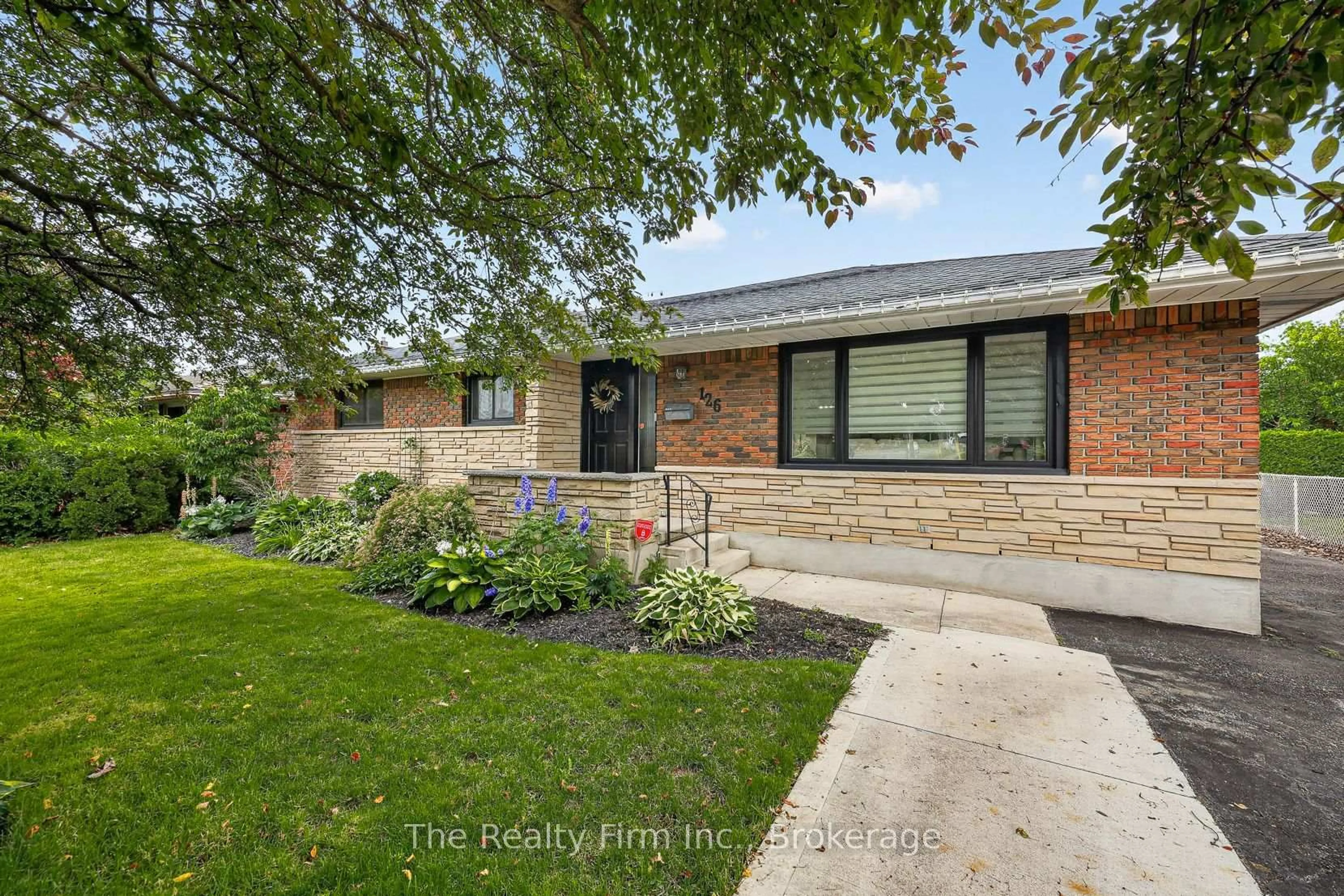 Home with brick exterior material, street for 126 Springbank Ave, Woodstock Ontario N4S 7P8