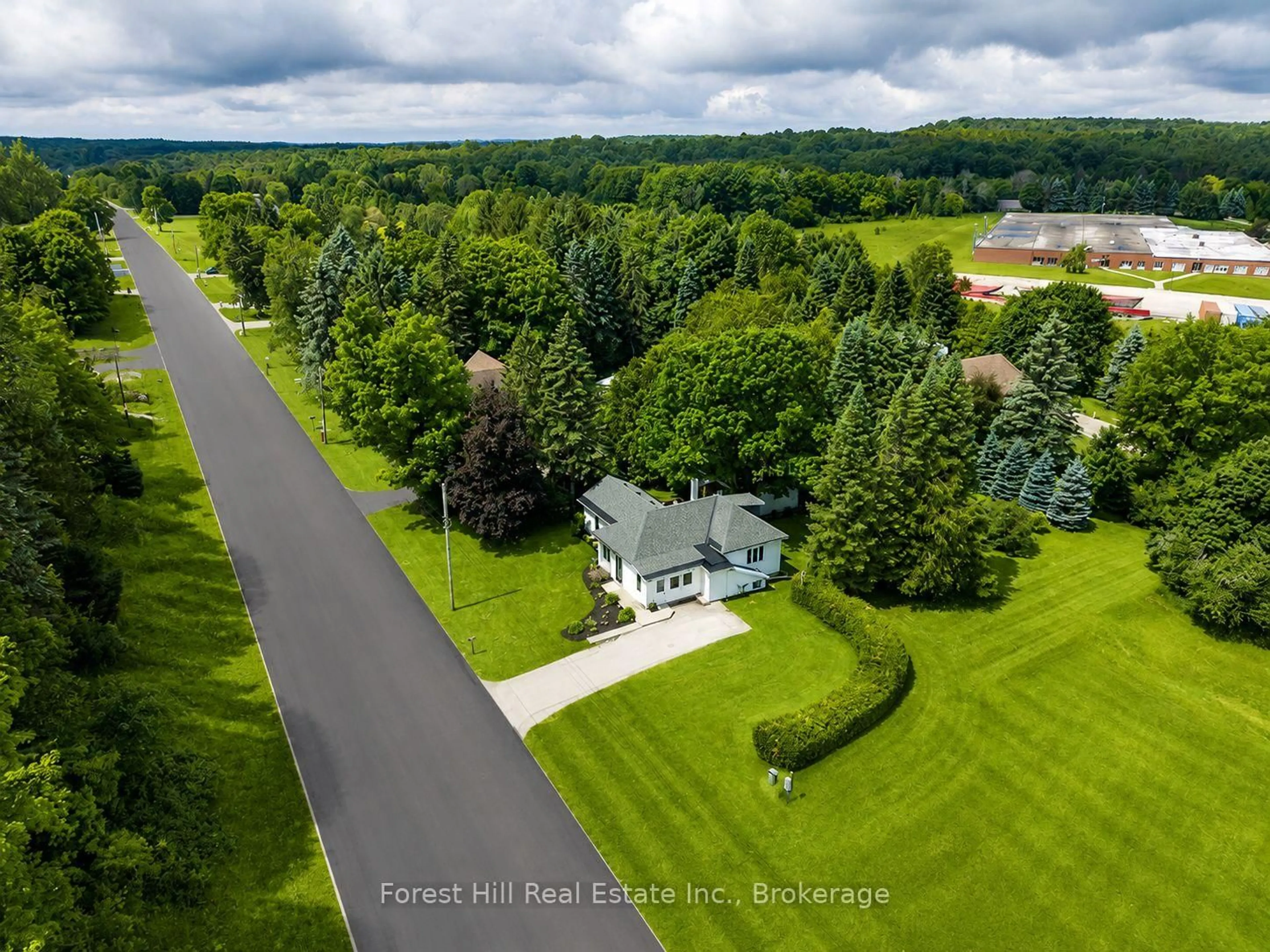 A pic from outside/outdoor area/front of a property/back of a property/a pic from drone, forest/trees view for 350 Main St, Grey Highlands Ontario N0C 1H0