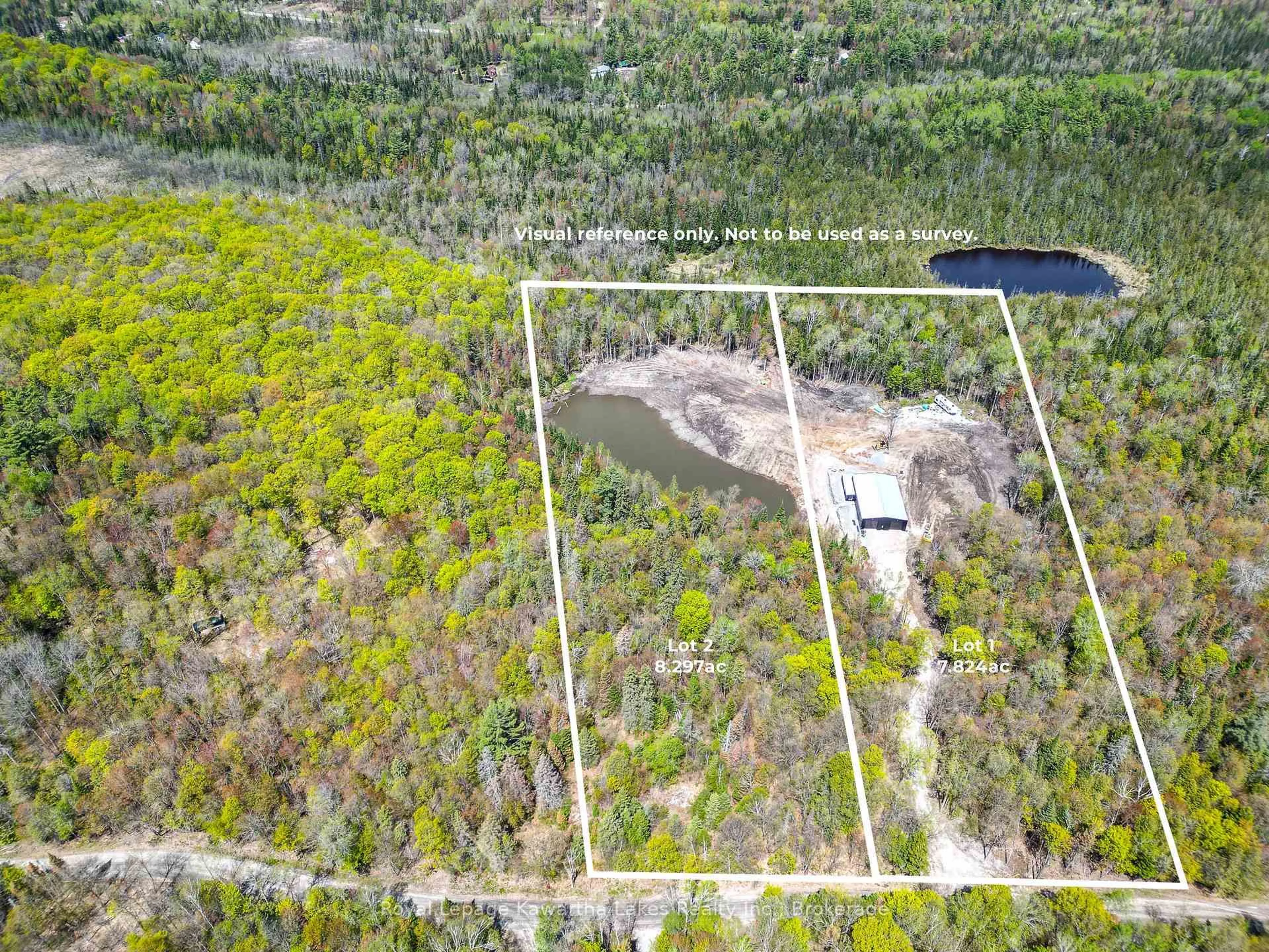 A pic from outside/outdoor area/front of a property/back of a property/a pic from drone, forest/trees view for 1851 Contau Lake Rd, Highlands East Ontario K0M 1R0