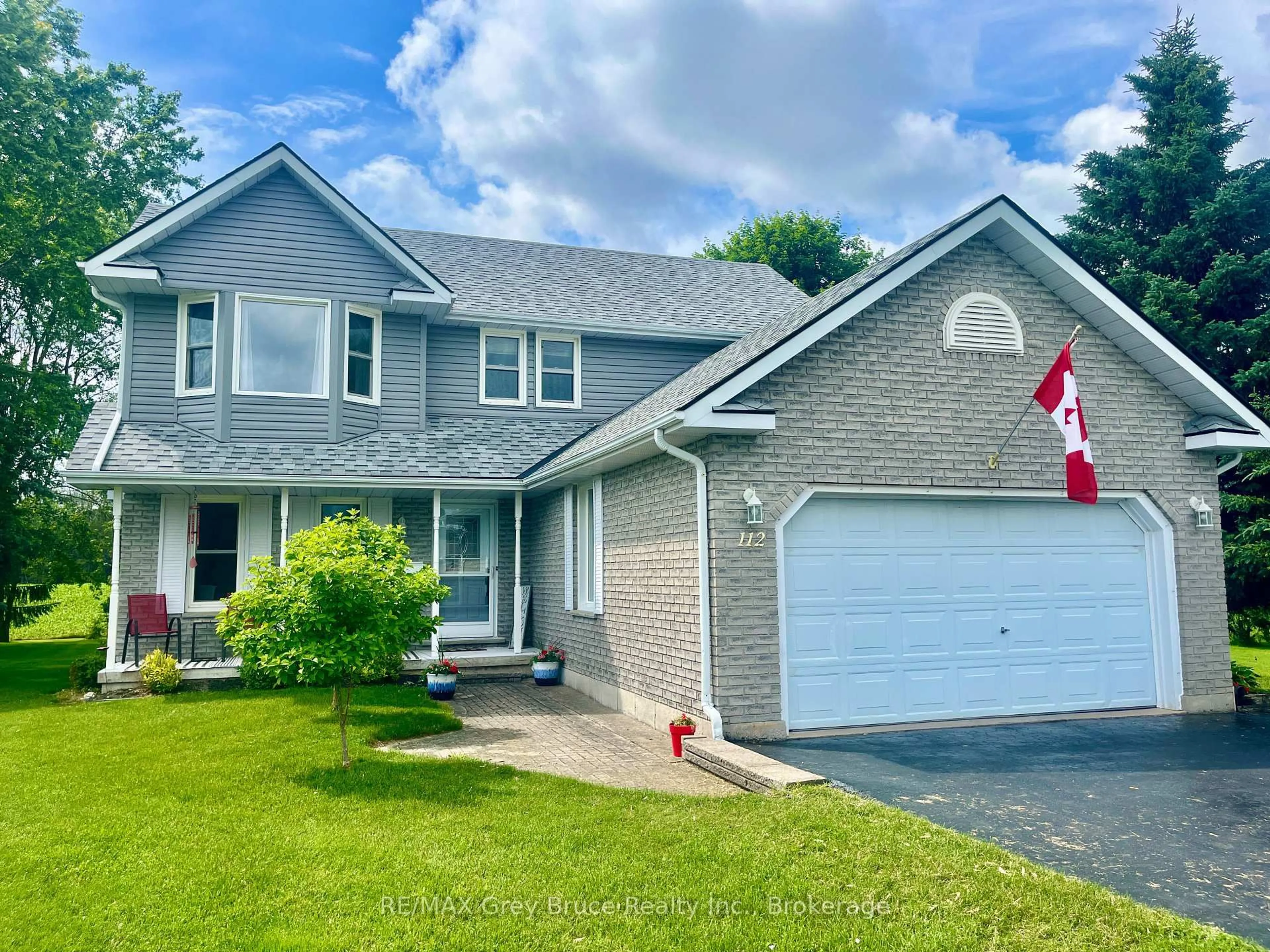 Home with vinyl exterior material, street for 112 Mary Ave, Georgian Bluffs Ontario N4K 5N5