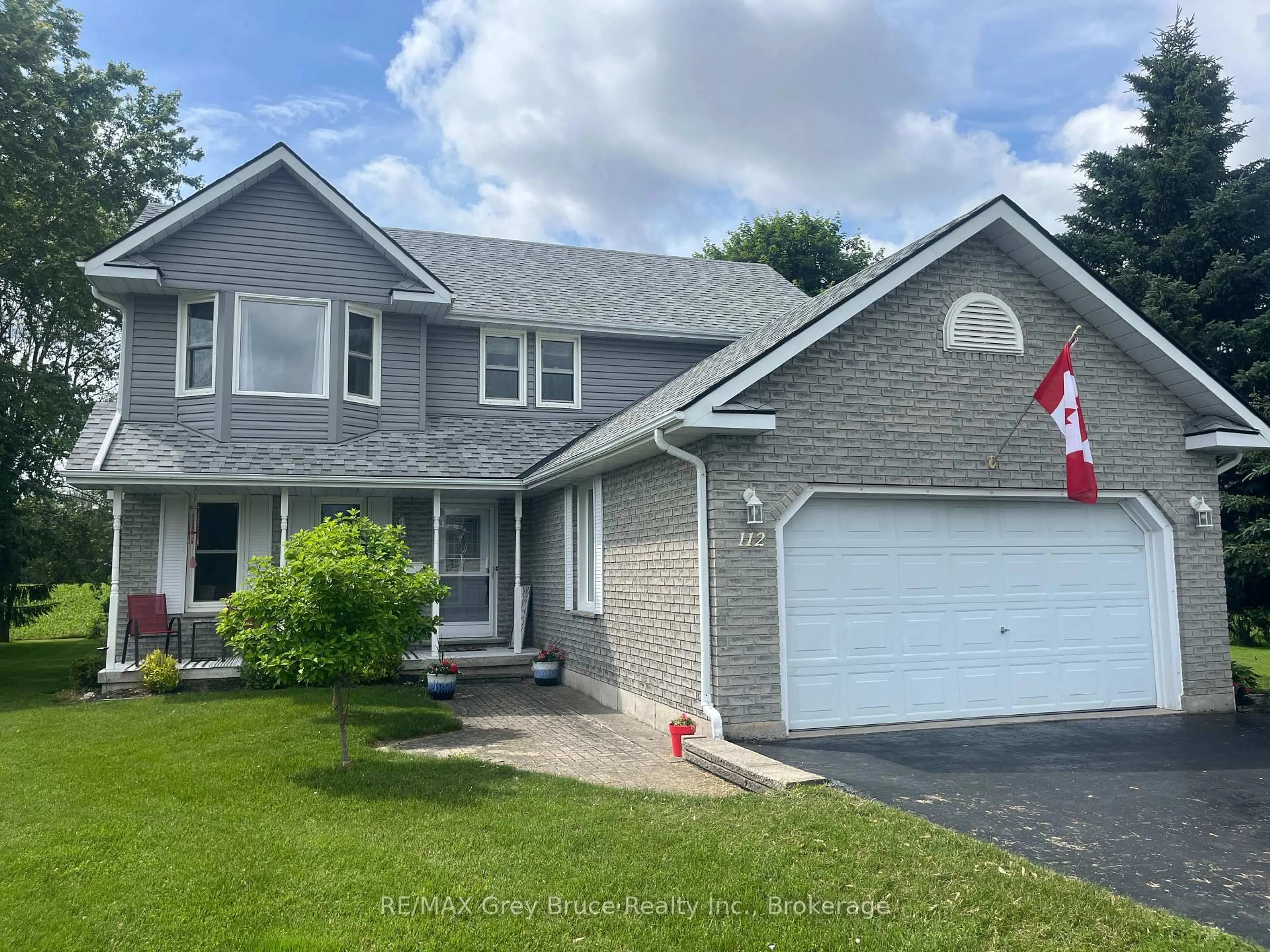 Home with vinyl exterior material, street for 112 Mary Ave, Georgian Bluffs Ontario N4K 5N5