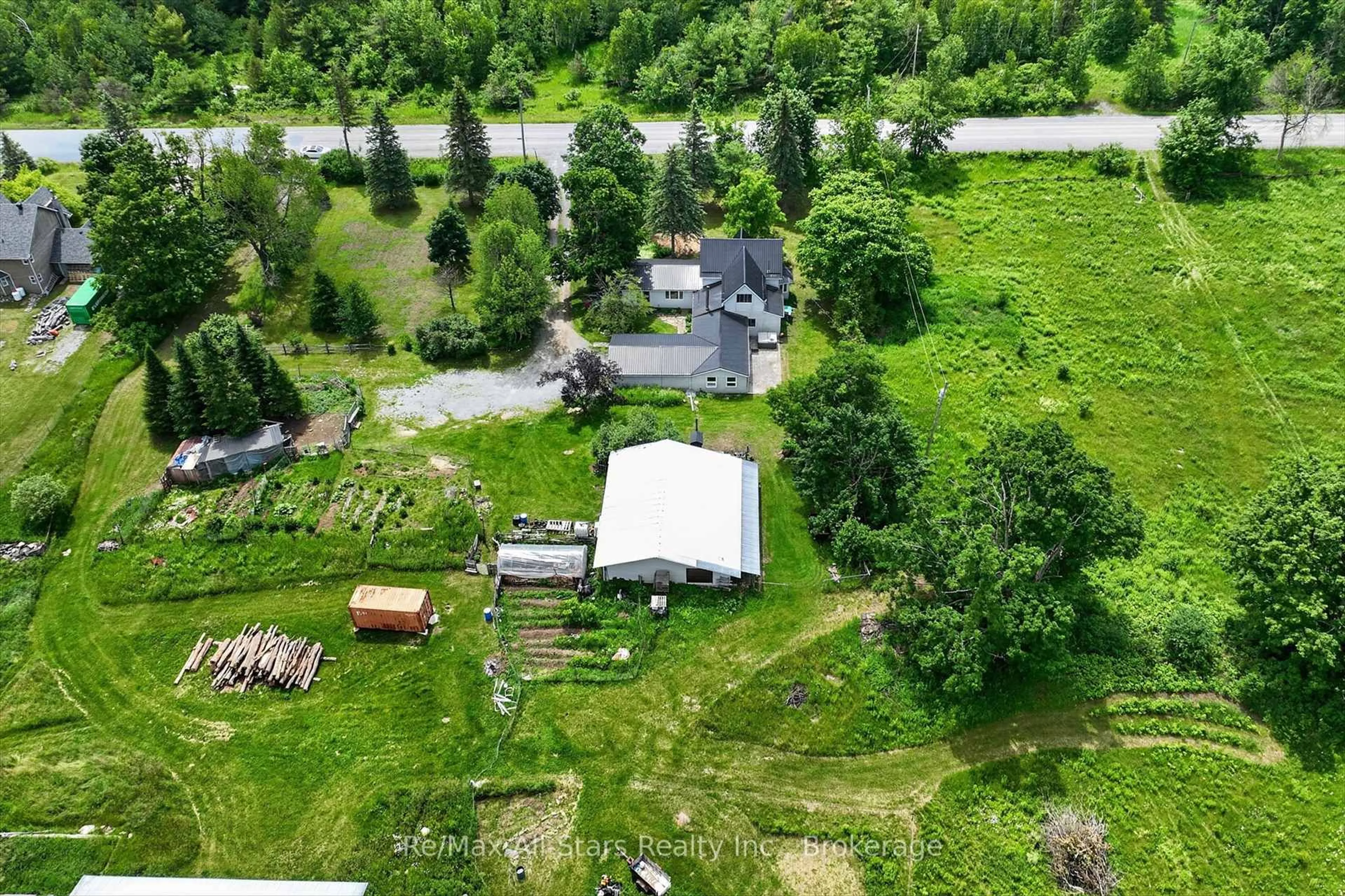 A pic from outside/outdoor area/front of a property/back of a property/a pic from drone, unknown for 4077 Monck Rd, Kawartha Lakes Ontario K0M 1K0