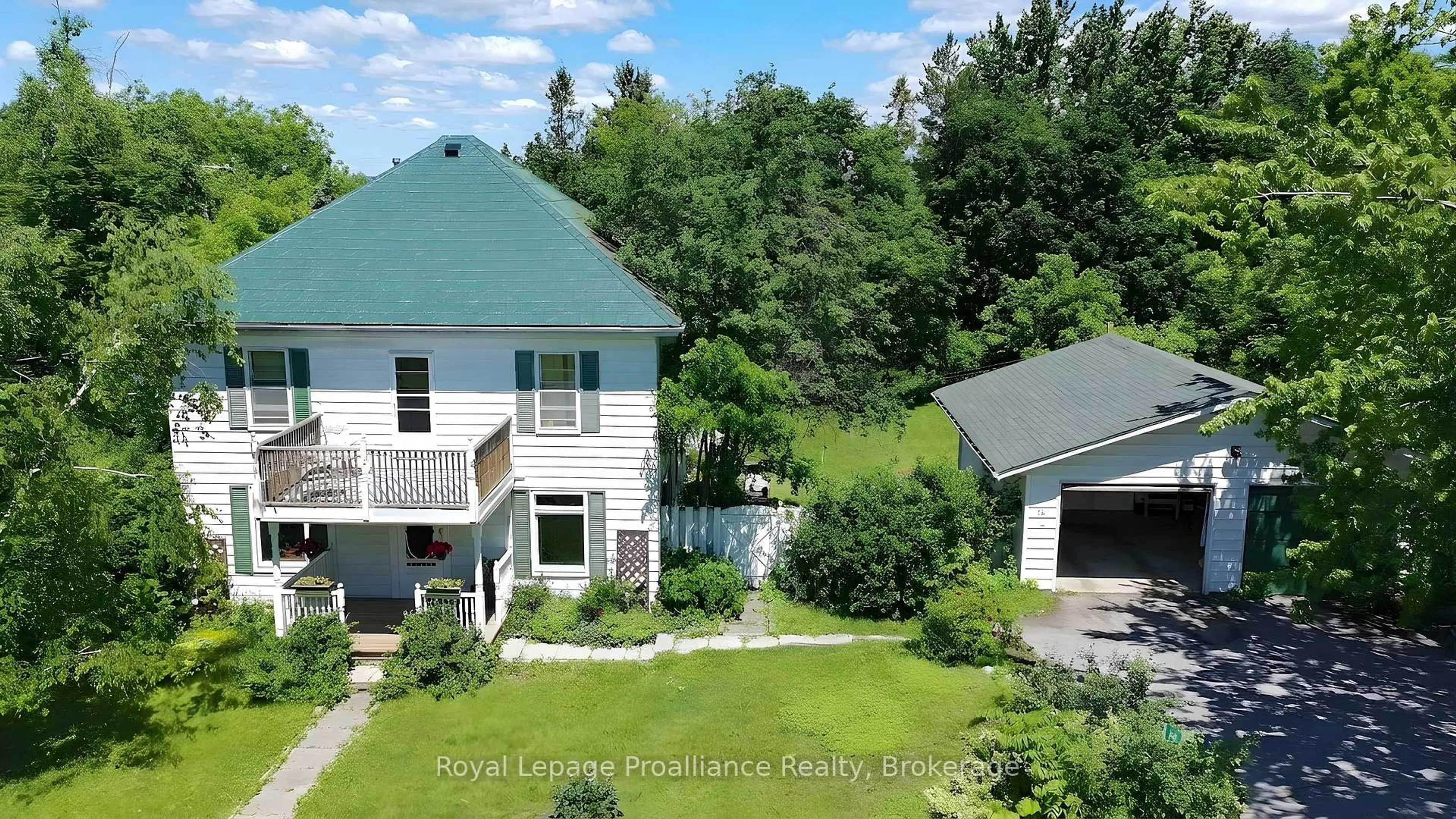 A pic from outside/outdoor area/front of a property/back of a property/a pic from drone, unknown for 14 County Rd 2 Rd, Otonabee-South Monaghan Ontario K0L 1B0