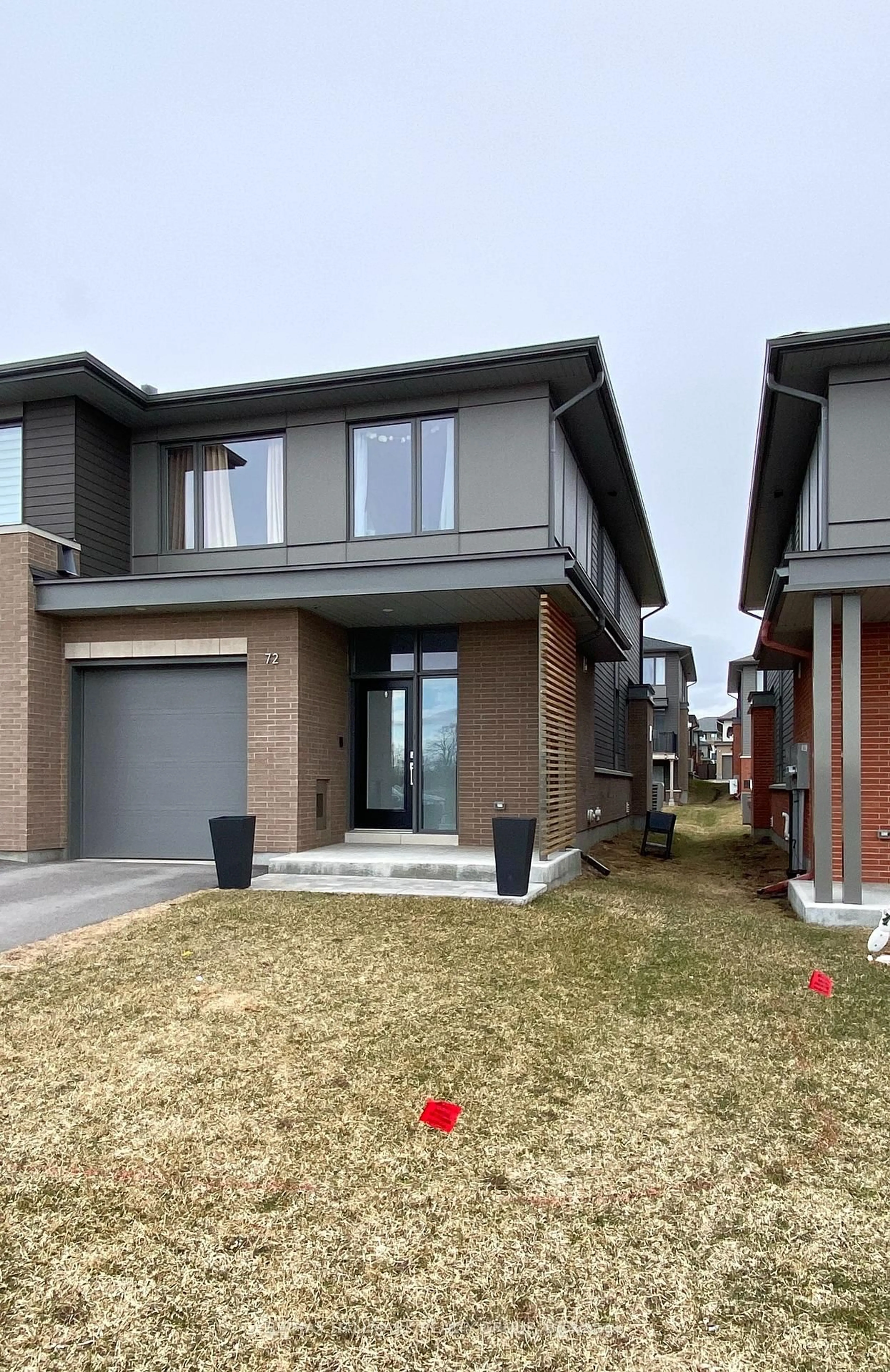 Home with brick exterior material, street for 72 MICHAEL STOQUA St, Ottawa Ontario K1K 5A2