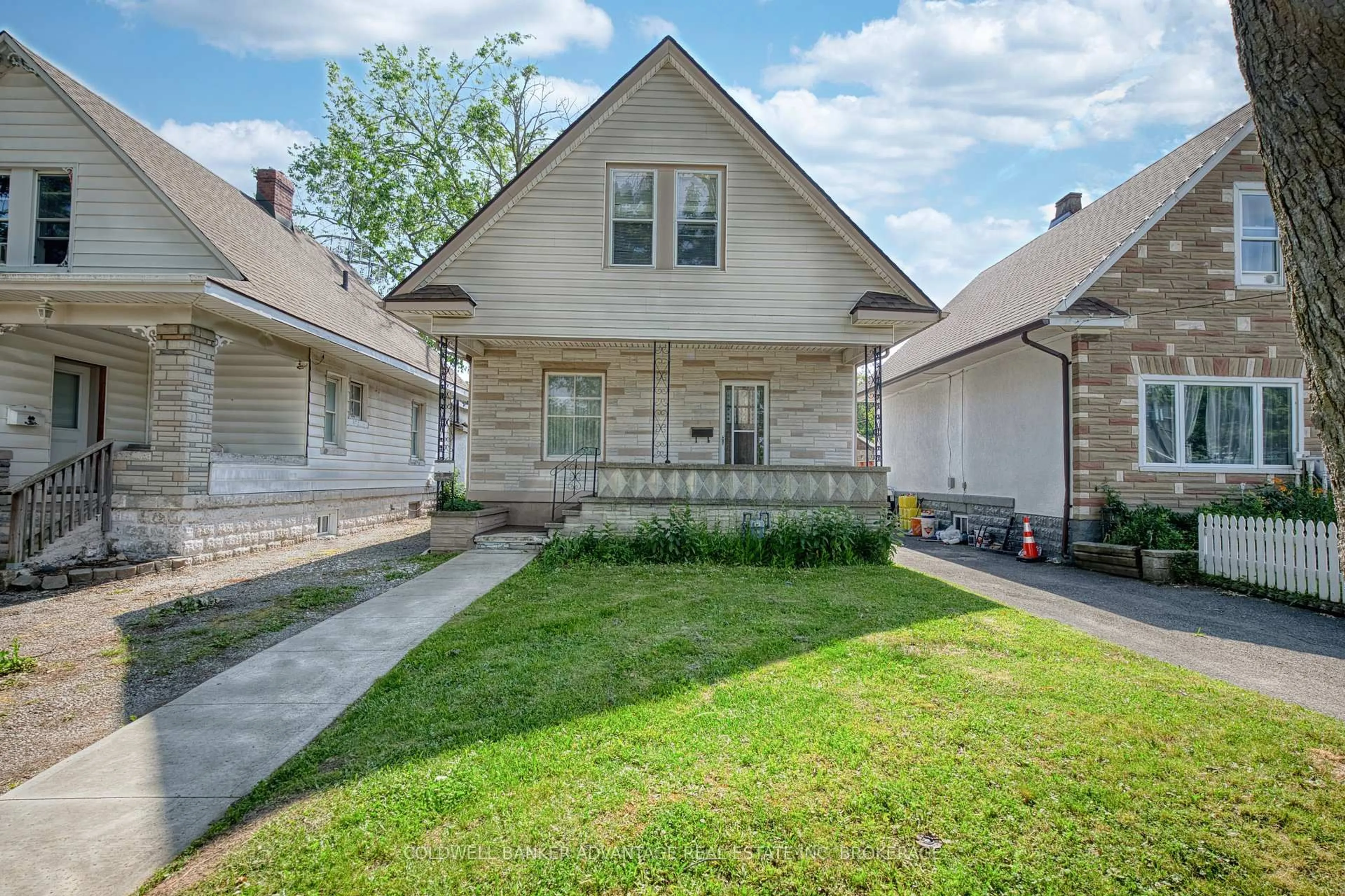 Home with brick exterior material, street for 48 Empire St, Welland Ontario L3B 2L4
