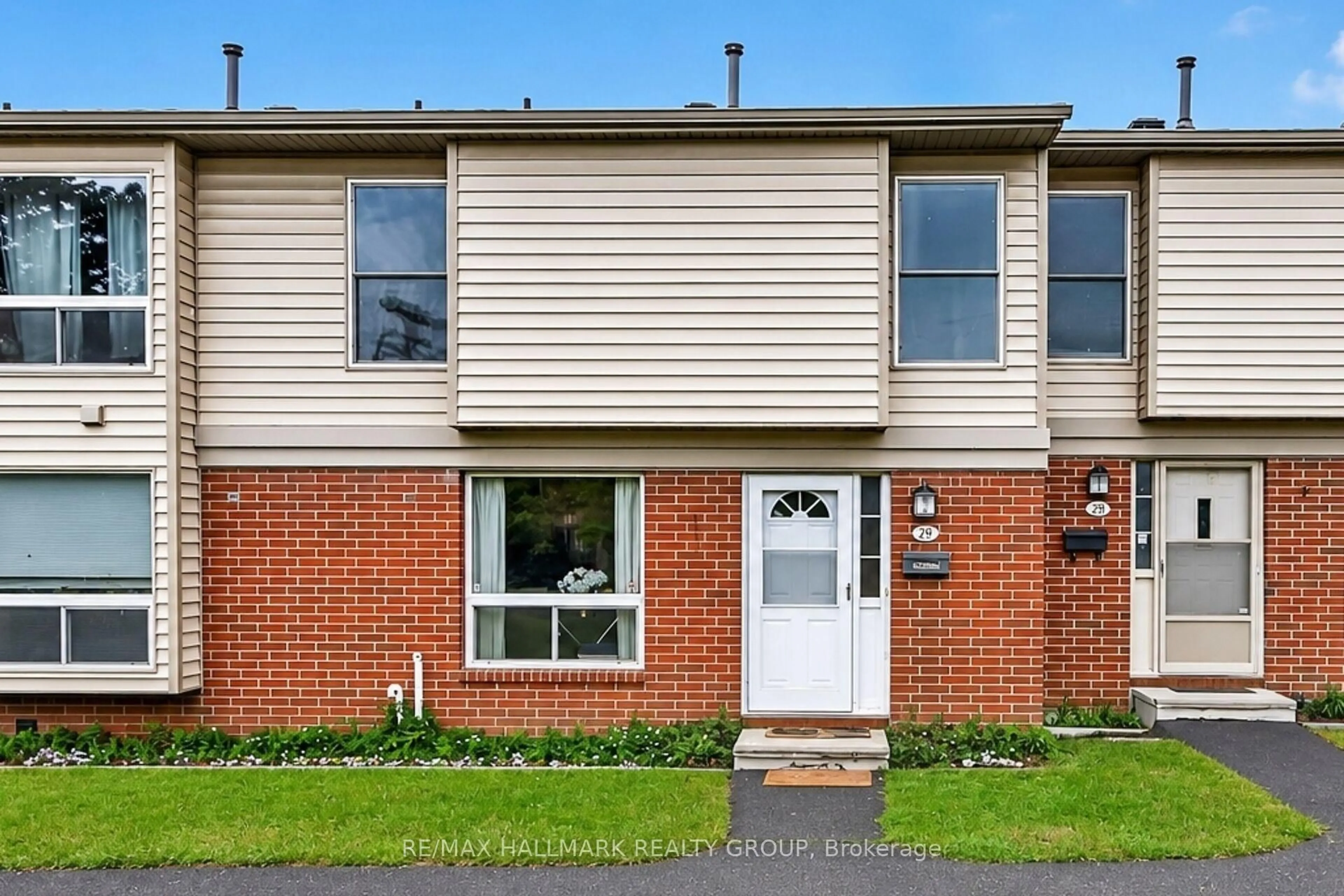 Home with brick exterior material, street for 840 Cahill Dr #29, Ottawa Ontario K1V 9K5