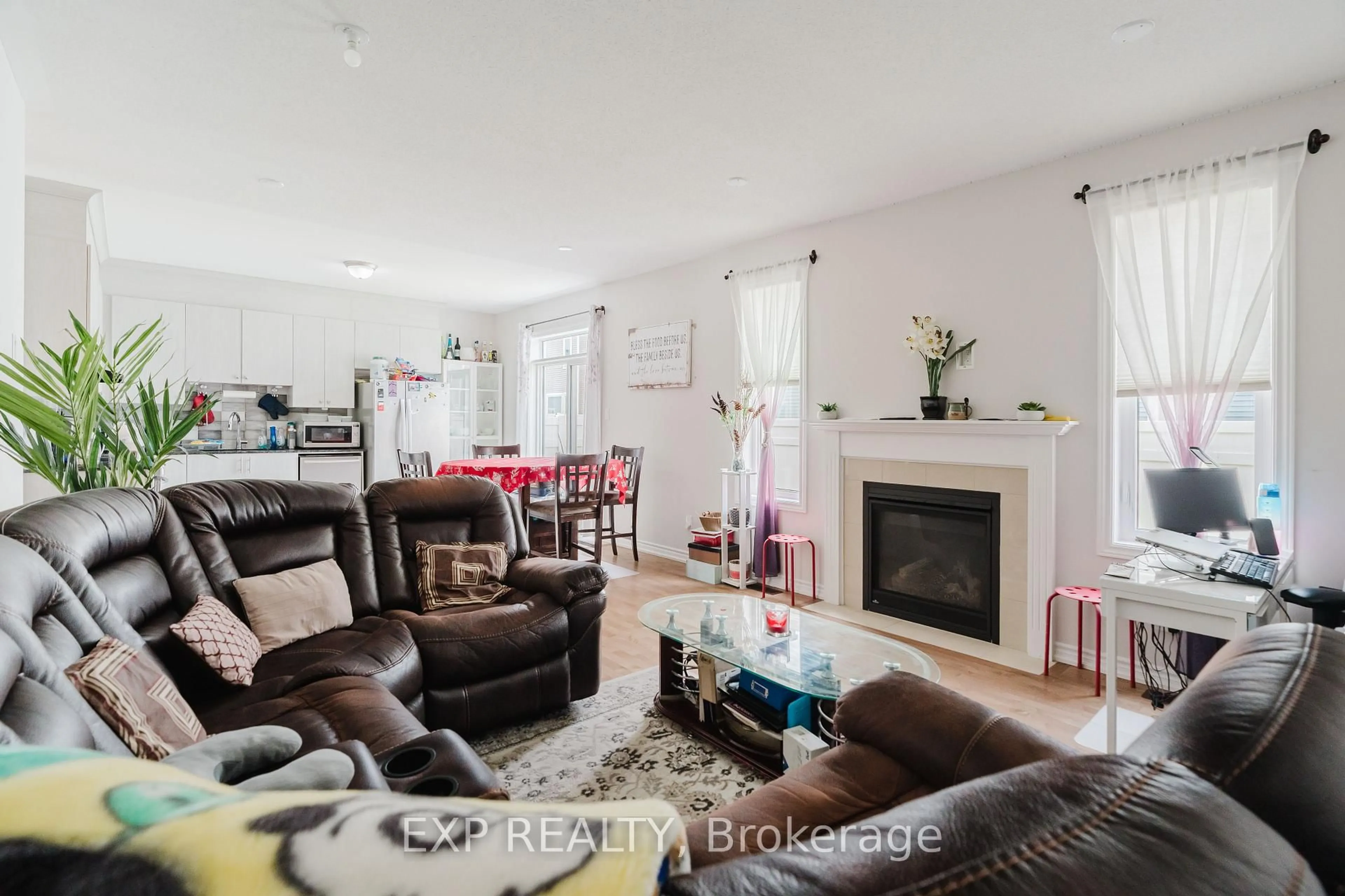 Living room with furniture, wood/laminate floor for 30 Coppermine St, Ottawa Ontario K2J 6P6