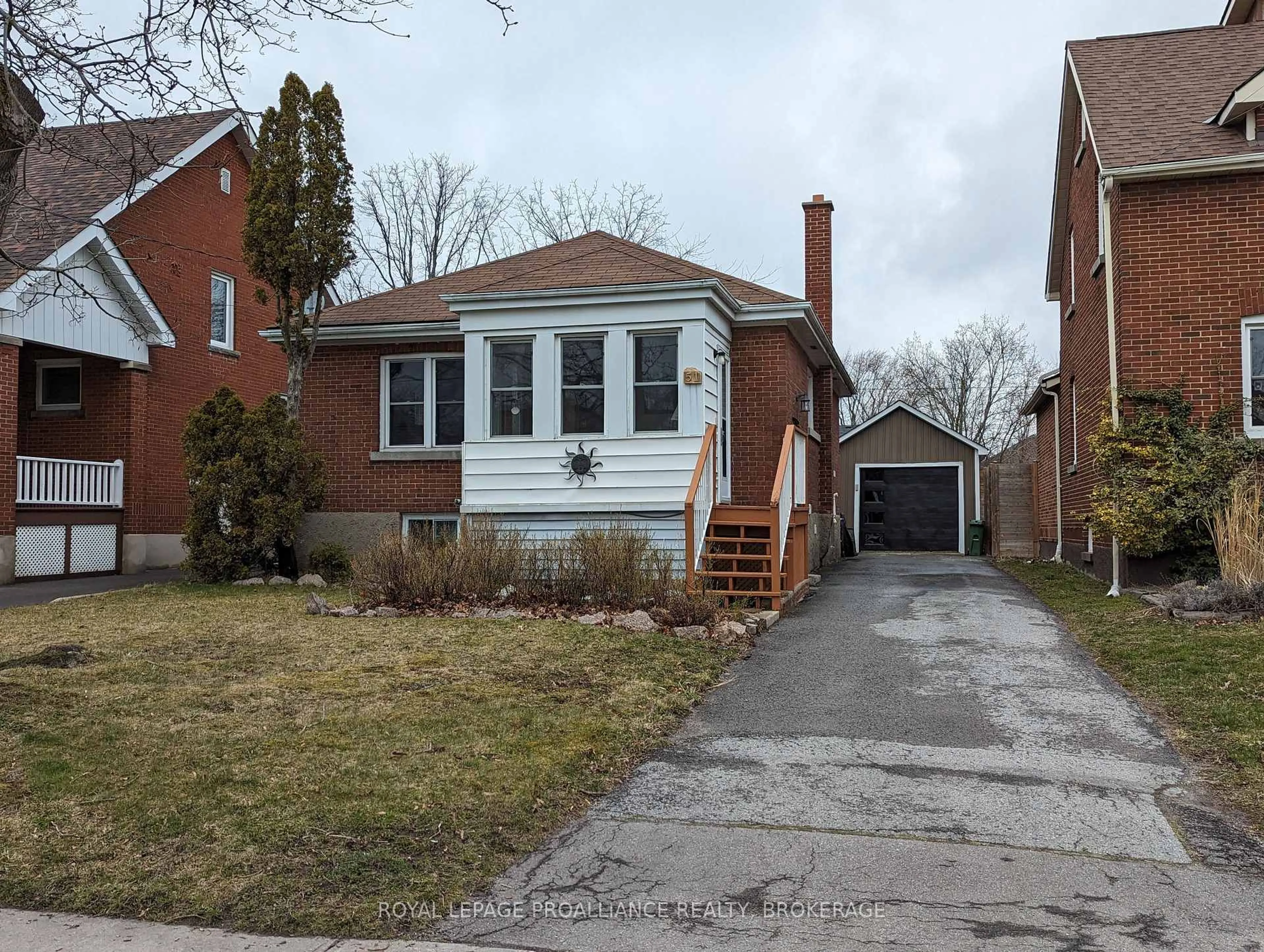 Home with brick exterior material, street for 51 Dundas St, Kingston Ontario K7L 1N4