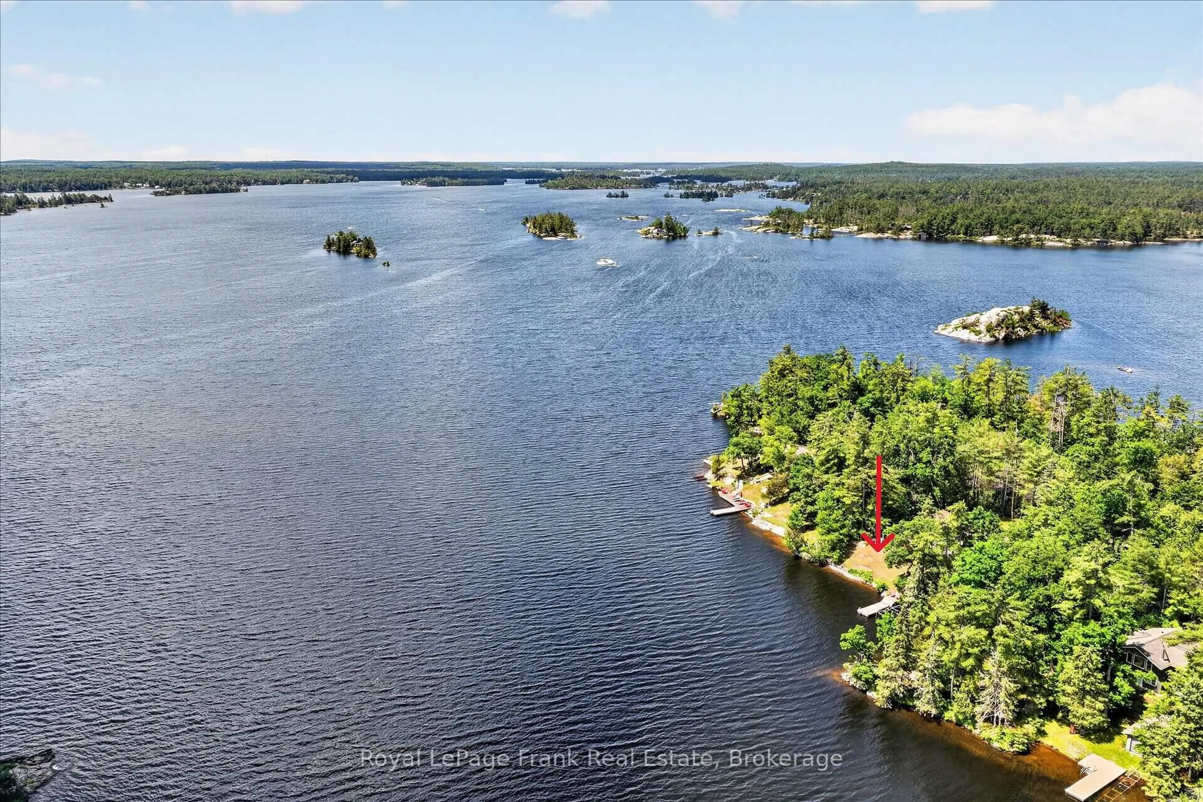 A pic from outside/outdoor area/front of a property/back of a property/a pic from drone, water/lake/river/ocean view for 61 Napier Cres, North Kawartha Ontario K0L 2H0