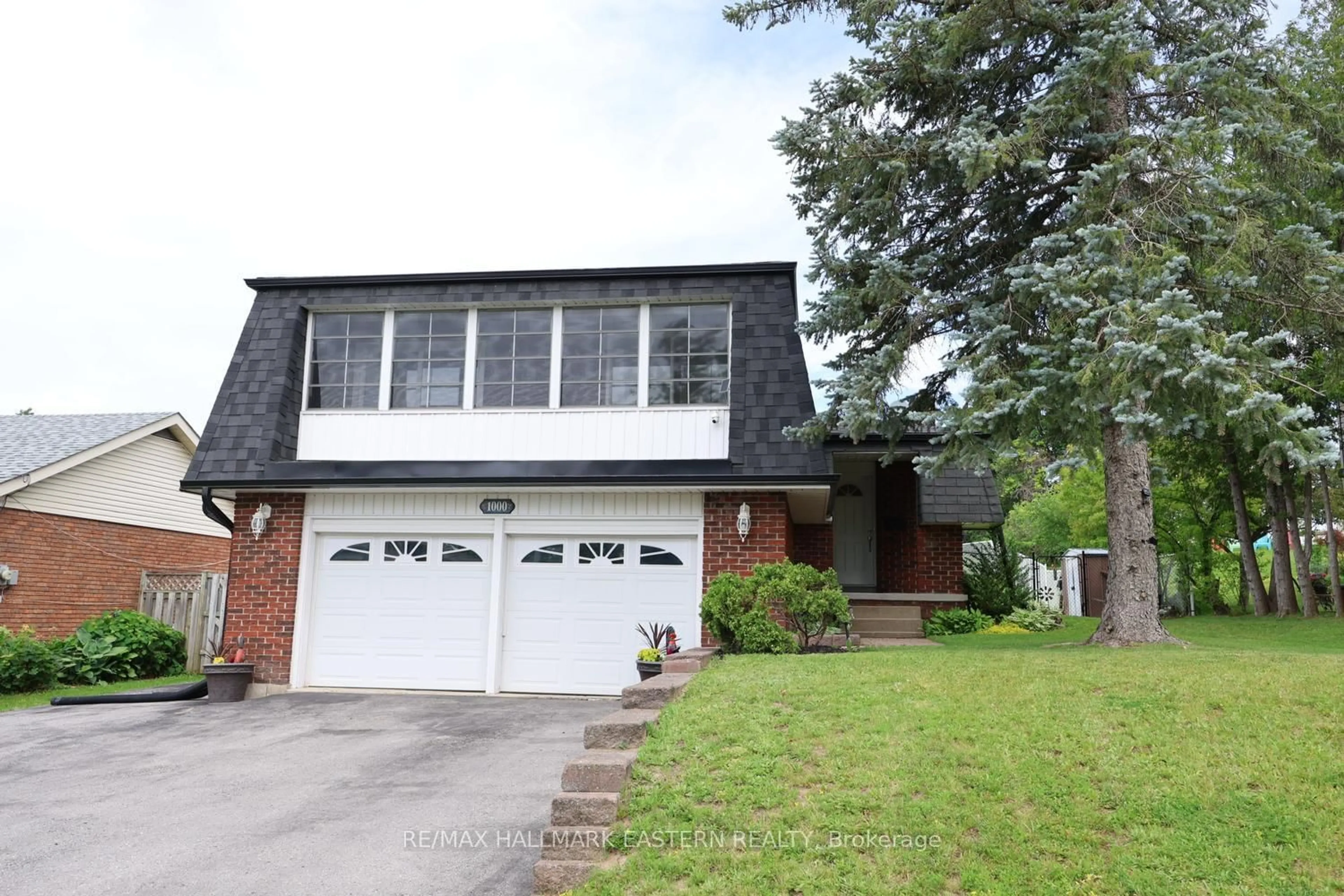 Home with brick exterior material, street for 1000 Cumberland Ave, Peterborough Ontario K9H 7B2