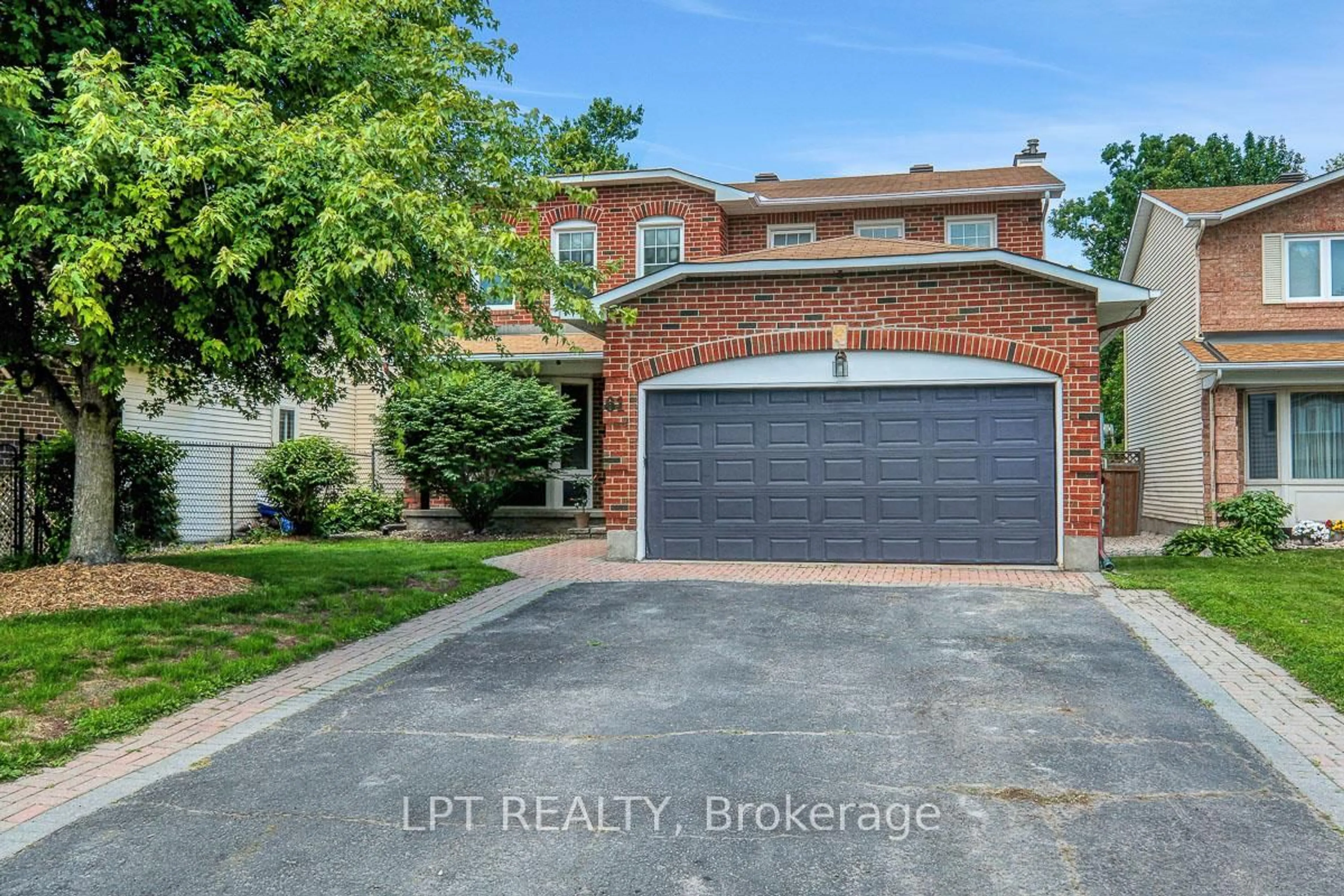 Home with brick exterior material, street for 61 Shetland Way, Ottawa Ontario K2M 1S4