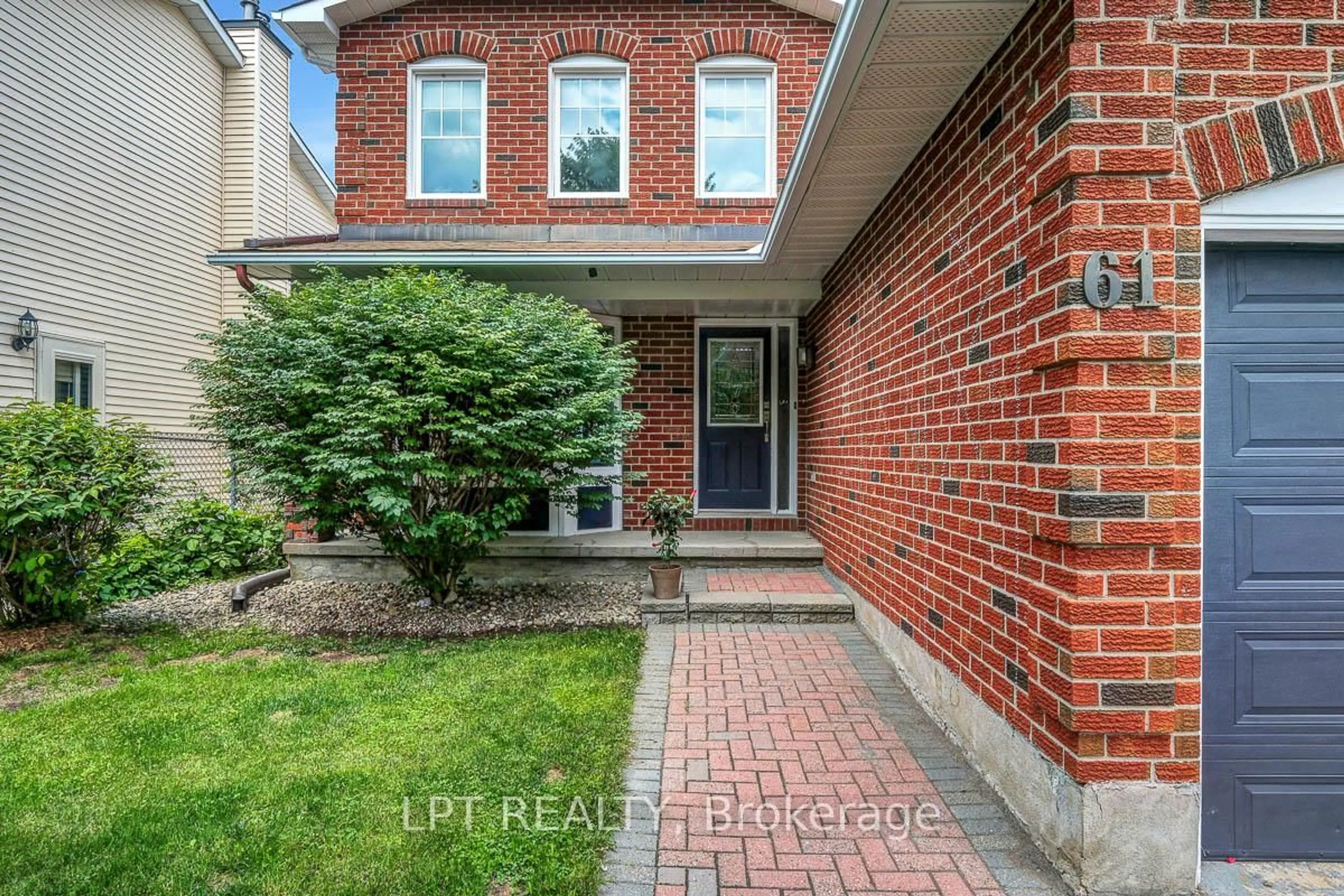 Home with brick exterior material, street for 61 Shetland Way, Ottawa Ontario K2M 1S4